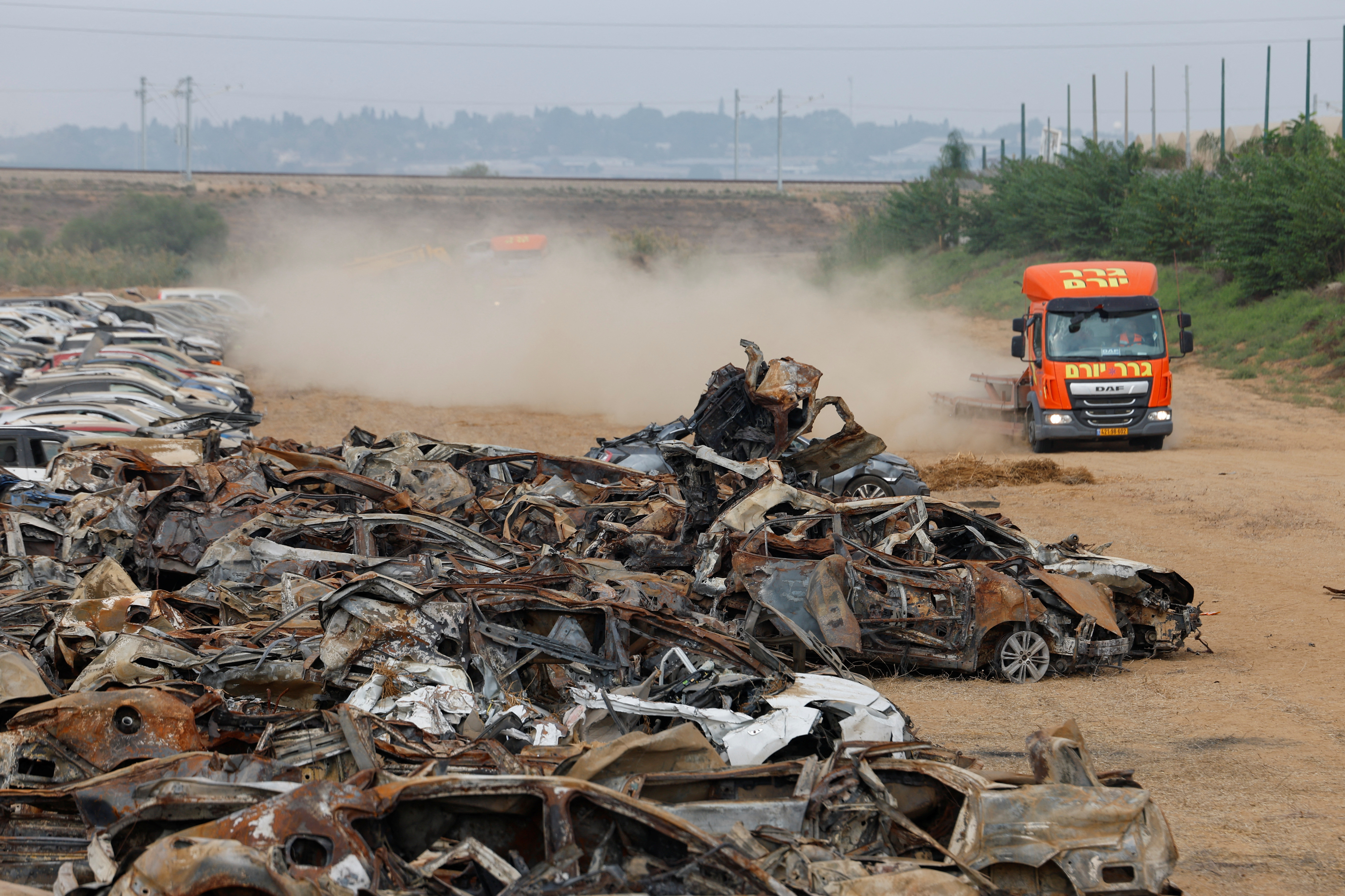 A view of vehicles destroyed by Hamas during the October 7 attack on Israel, collected in a field near the Israel-Gaza border