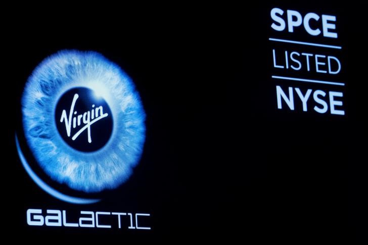 Virgin Galactic (SPCE) logo is displayed on a screen on the floor of the NYSE in New York