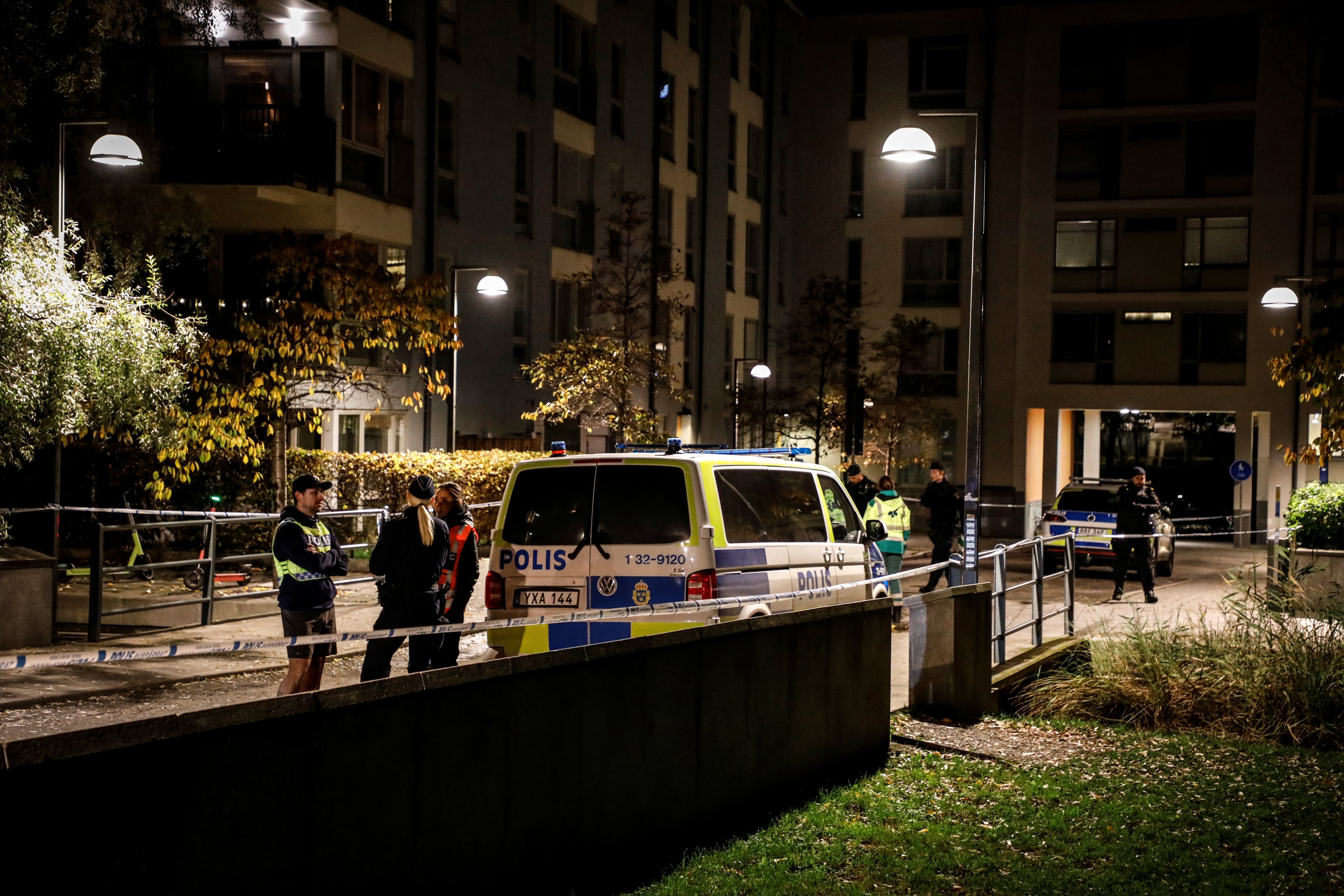 Police forensics work at the site where Swedish rapper Einar was reportedly shot dead, in Stockholm
