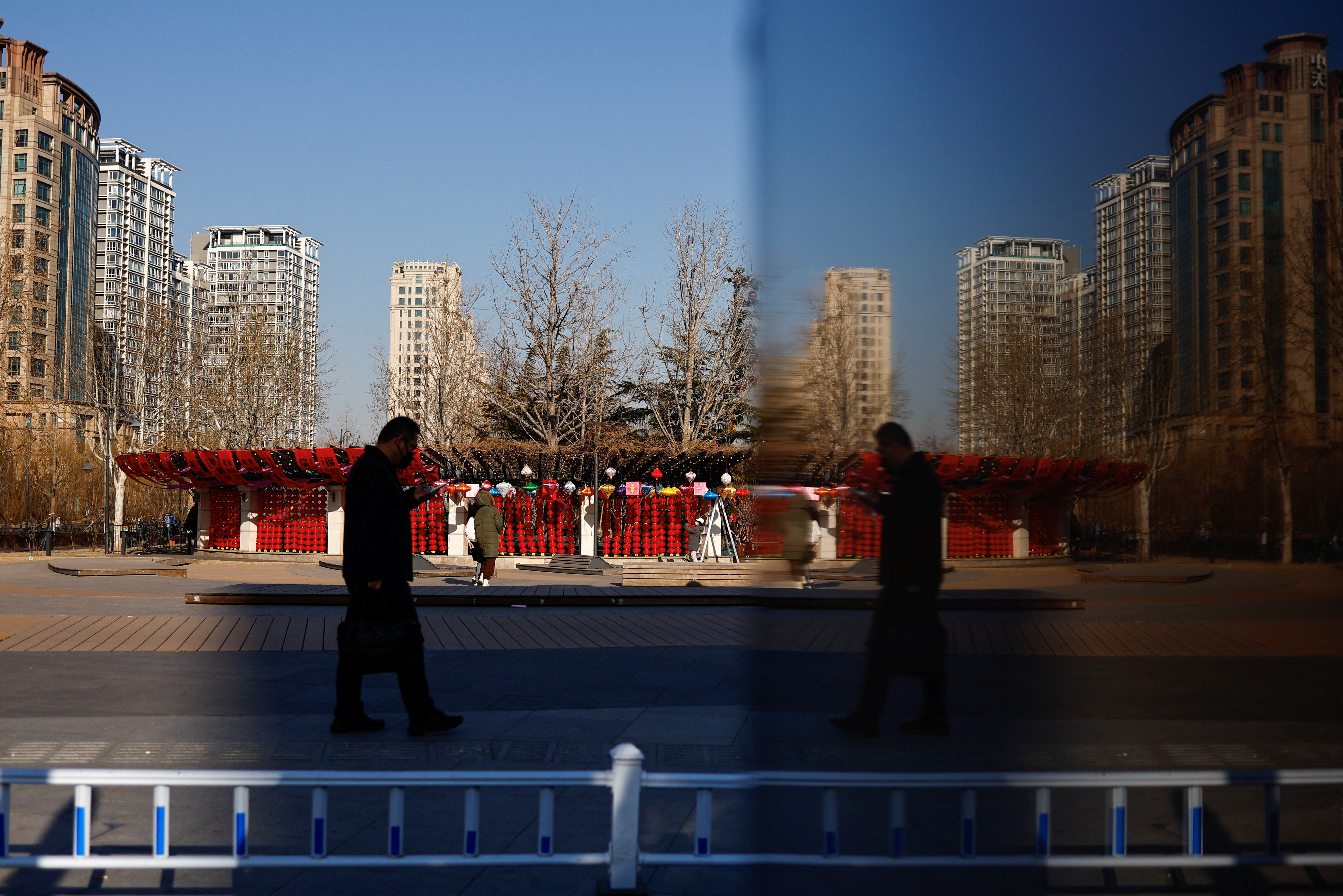 Person walks on a street in Beijing