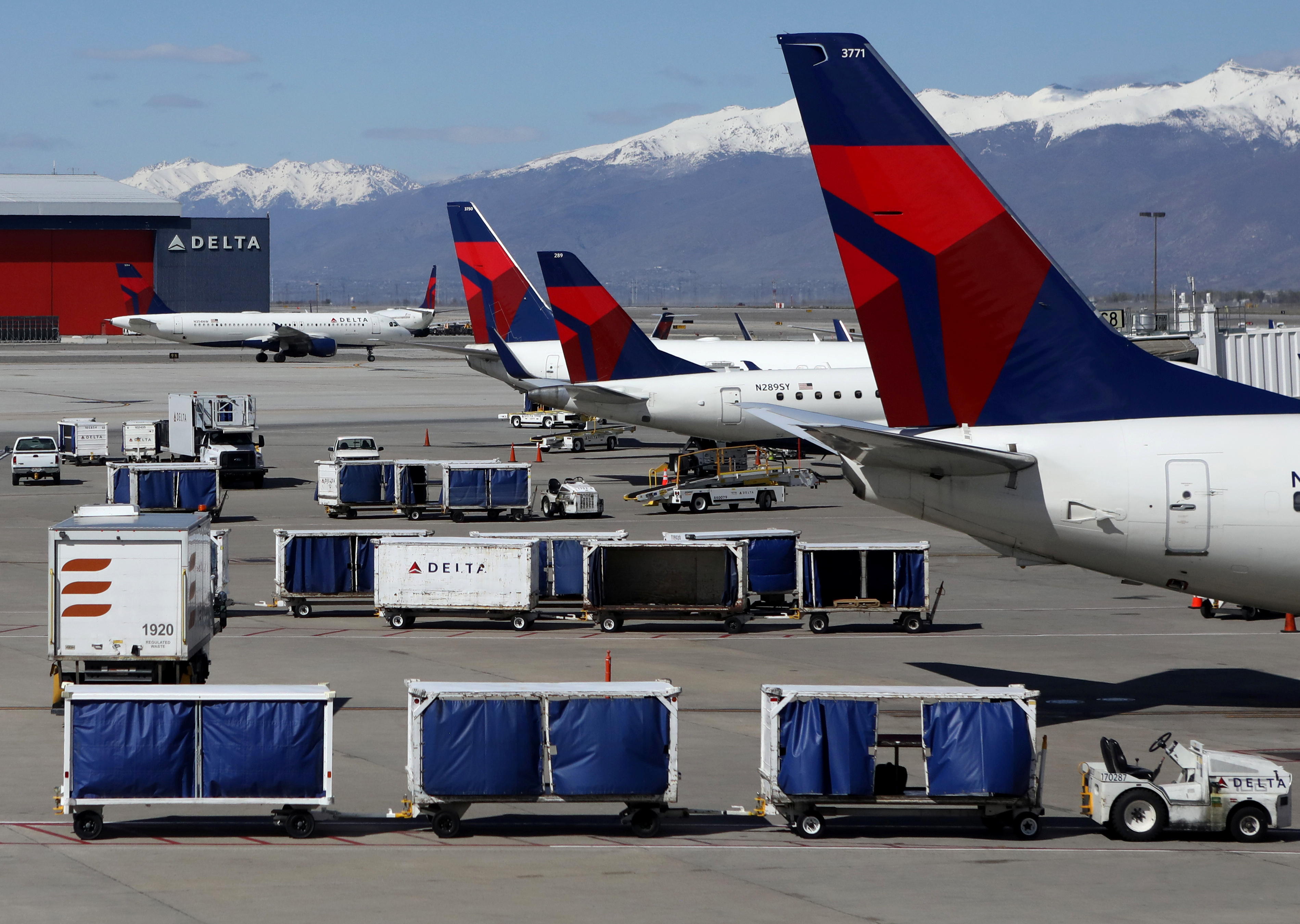 Delta Airlines planes are loaded and unloaded at Salt Lake City International Airport in Salt Lake City