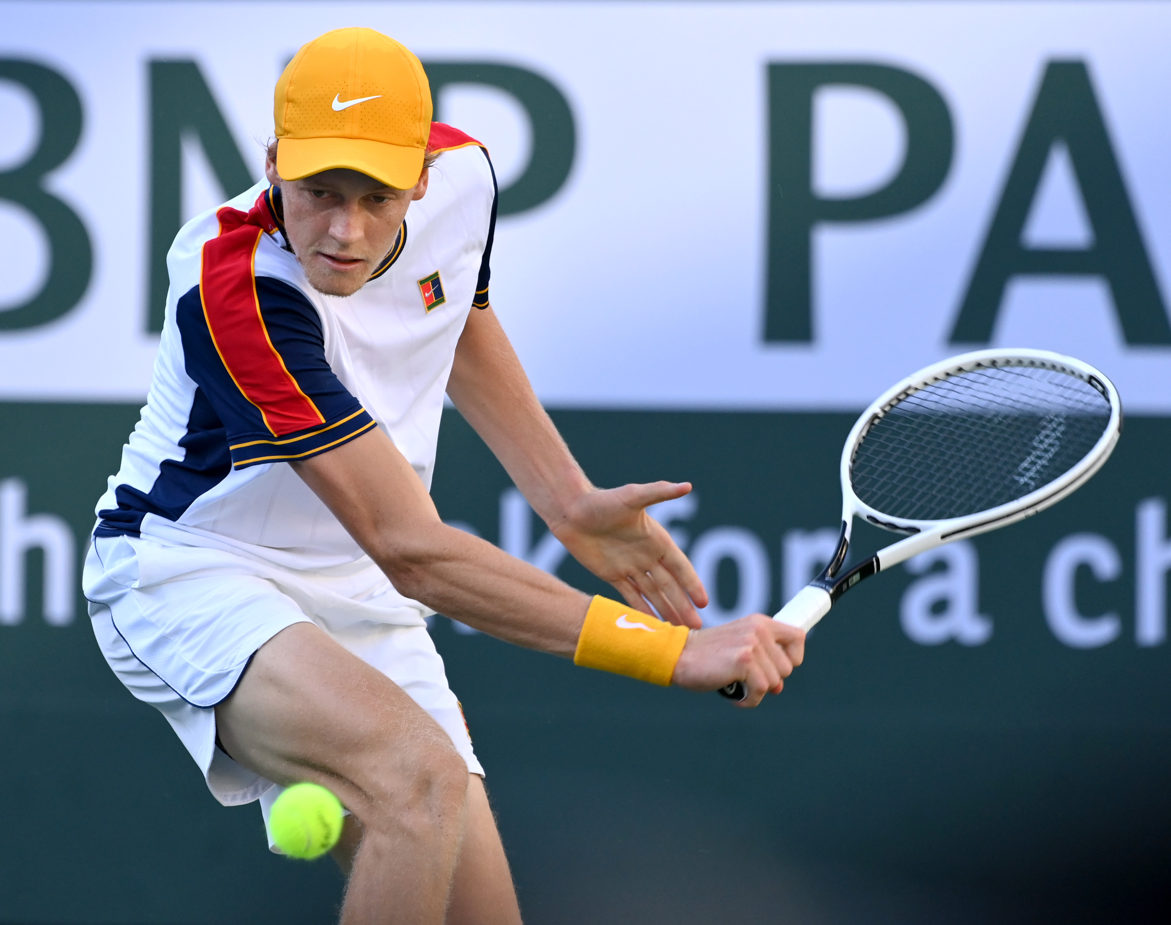 Oct 13, 2021; Indian Wells, CA, USA; Jannik Sinner (ITA) hits a shot against Taylor Fritz (USA) in their fourth round match during the BNP Paribas Open at the Indian Wells Tennis Garden. Mandatory Credit: Jayne Kamin-Oncea-USA TODAY Sports
