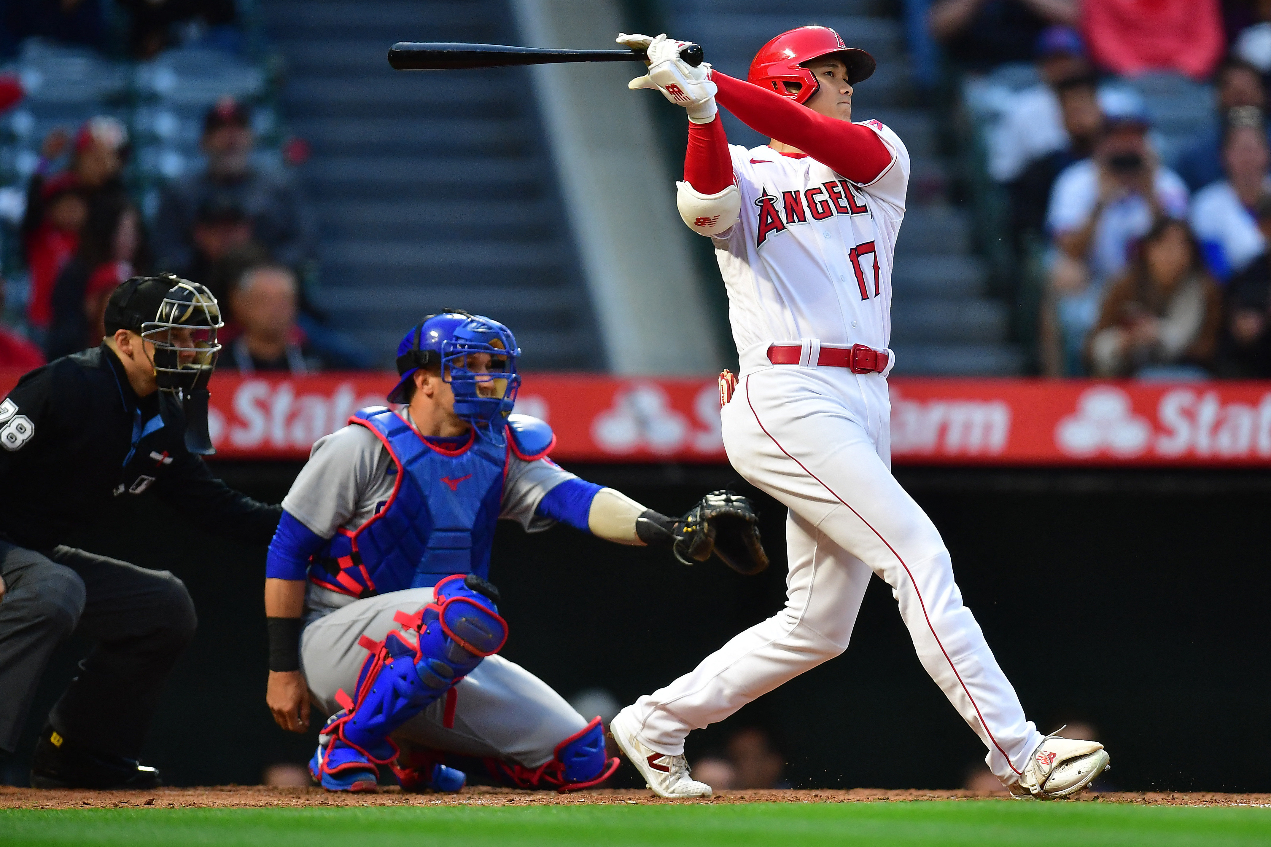 Los Angeles Angels' Shohei Ohtani rounds the bases after hitting a home run  during the fourth inning of a baseball game against the Chicago Cubs  Tuesday, June 6, 2023, in Anaheim, Calif. (