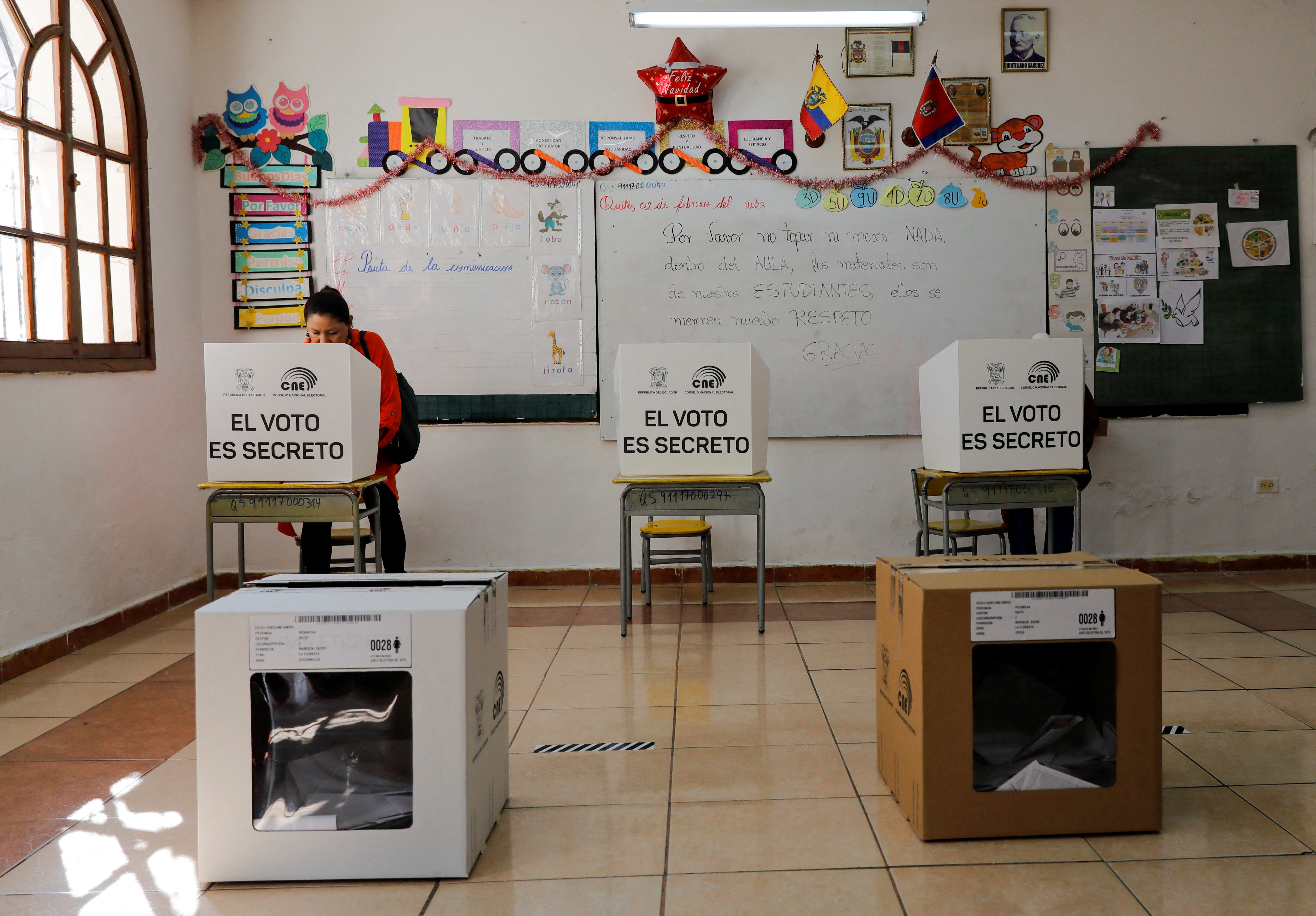 Ecuadorians cast their votes in constitutional referendum and local elections, in Quito
