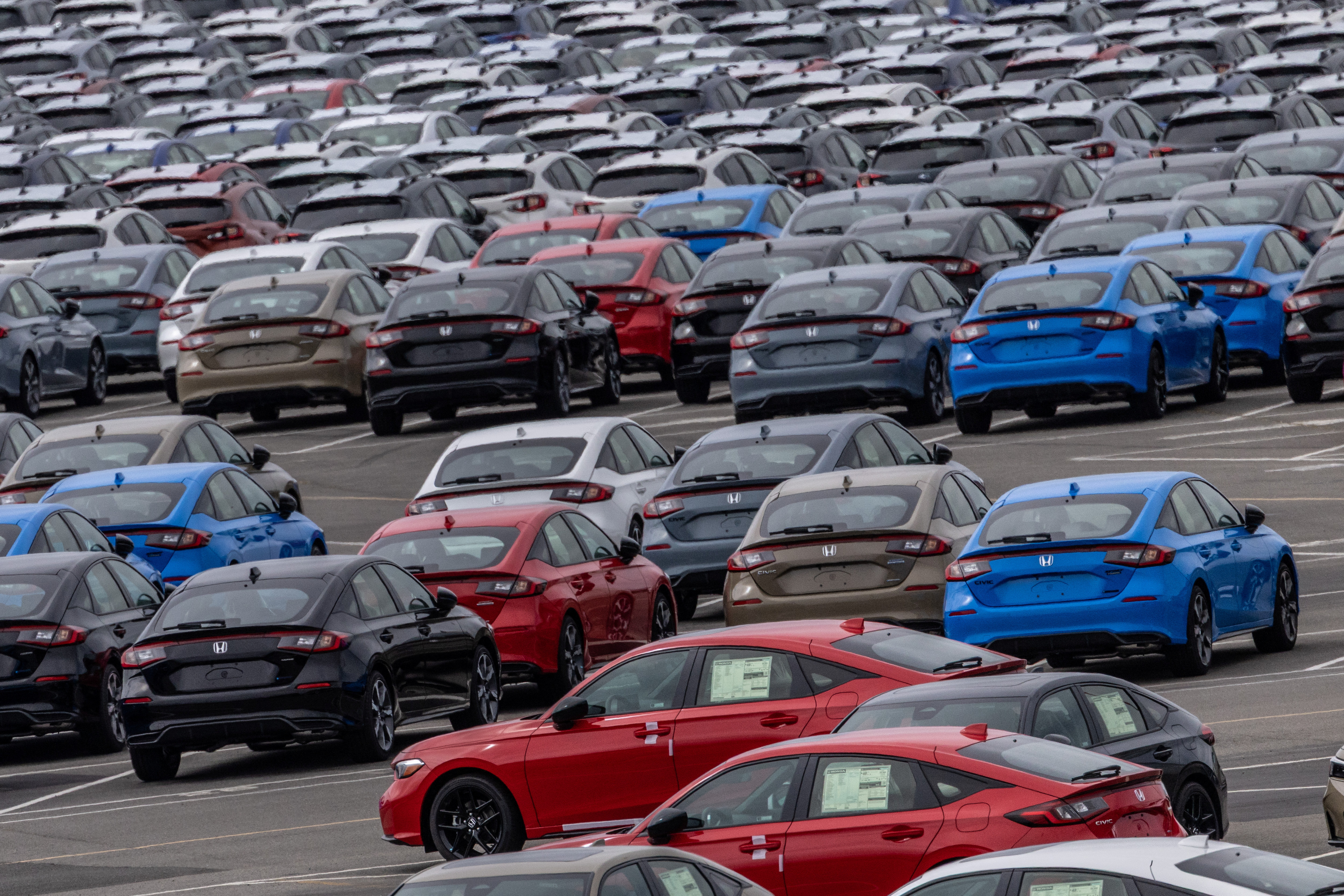 Honda Q1 operating profit halves on tariffs, but lifts full-year forecast |  Reuters