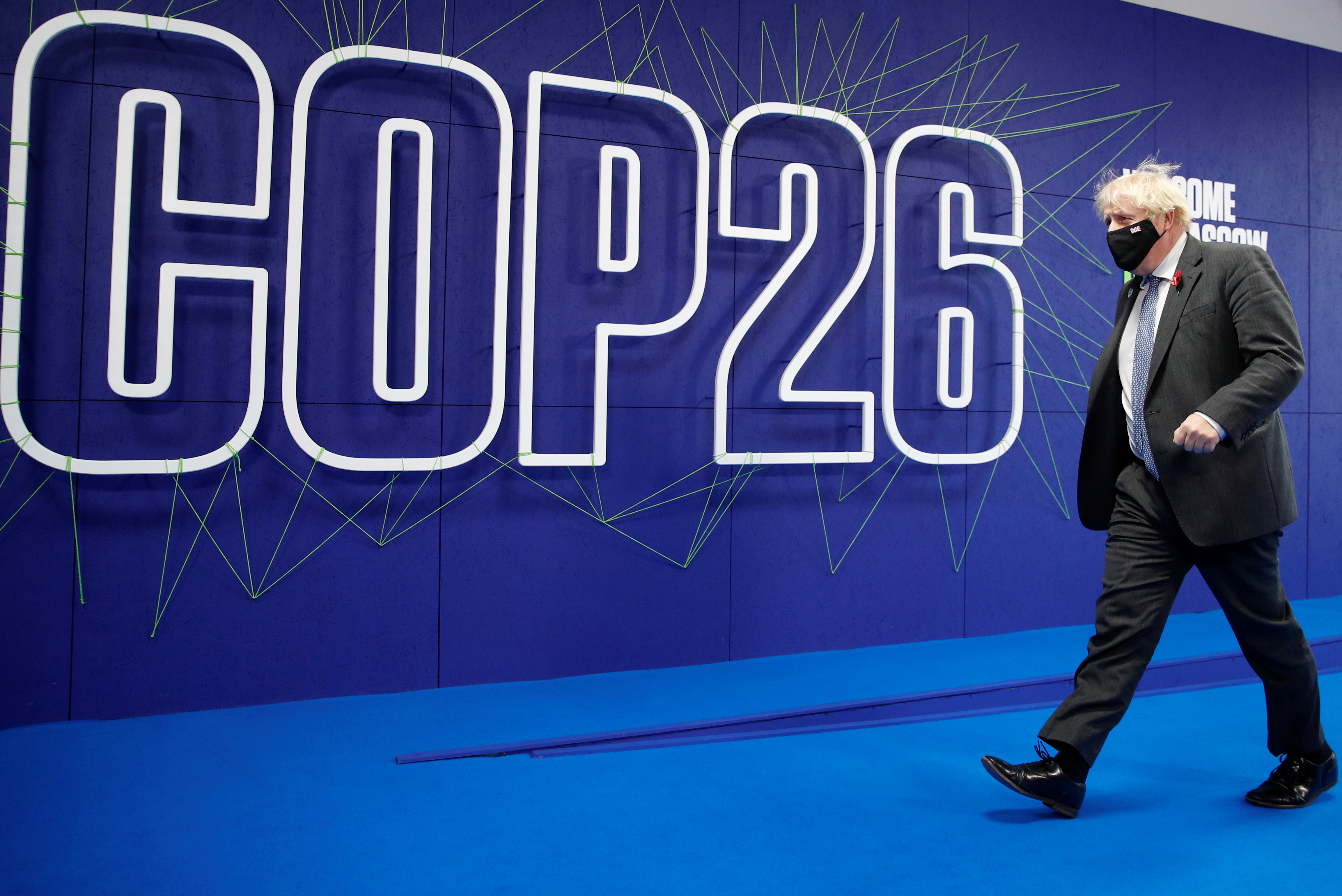 Britain's Prime Minister Boris Johnson arrives for the UN Climate Change Conference (COP26) in Glasgow, Scotland, Britain, November 10, 2021. REUTERS/Phil Noble/Pool
