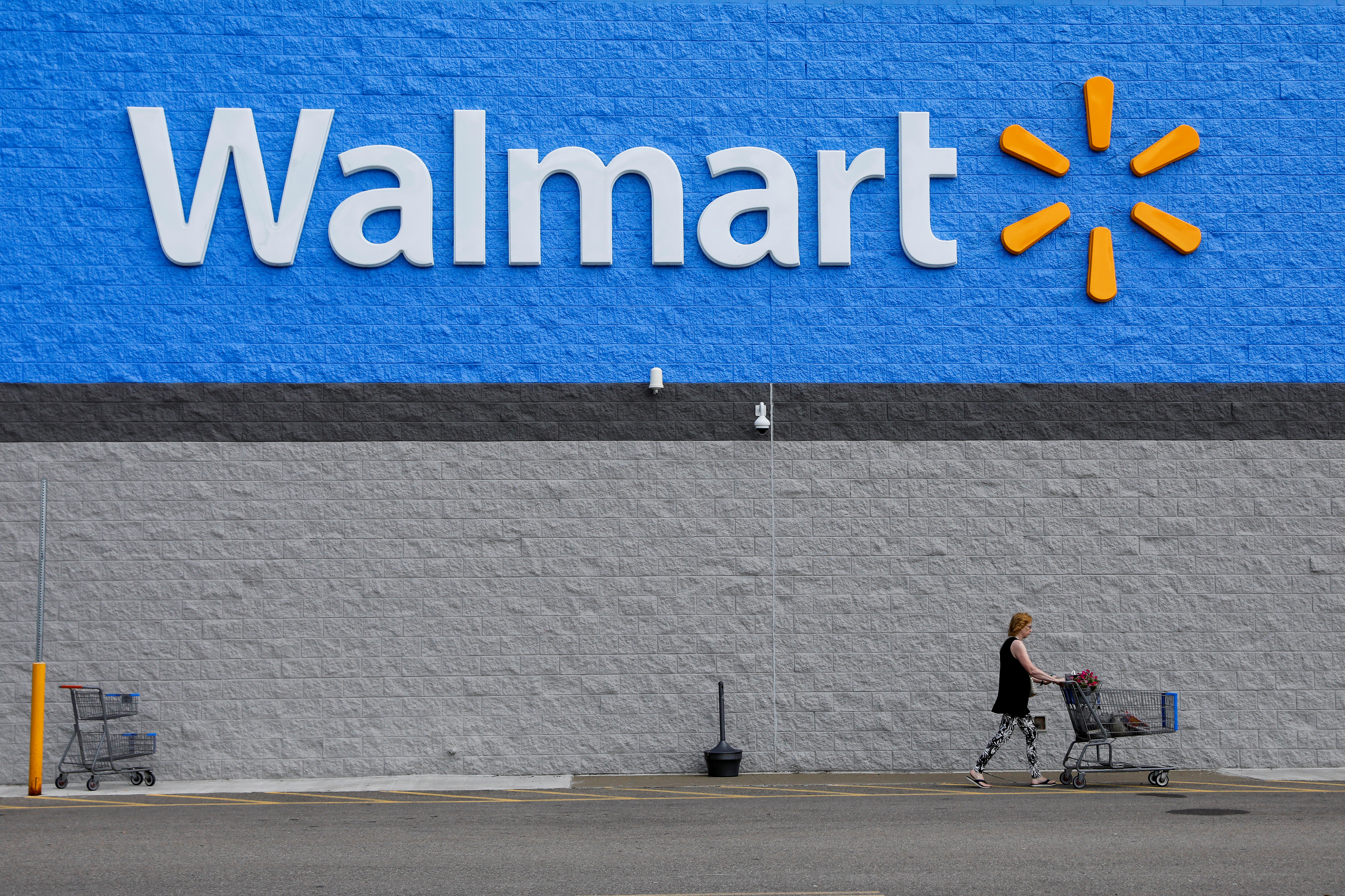 A shopper is seen without a mask after leaving a Walmart store in Bradford, Pennsylvania