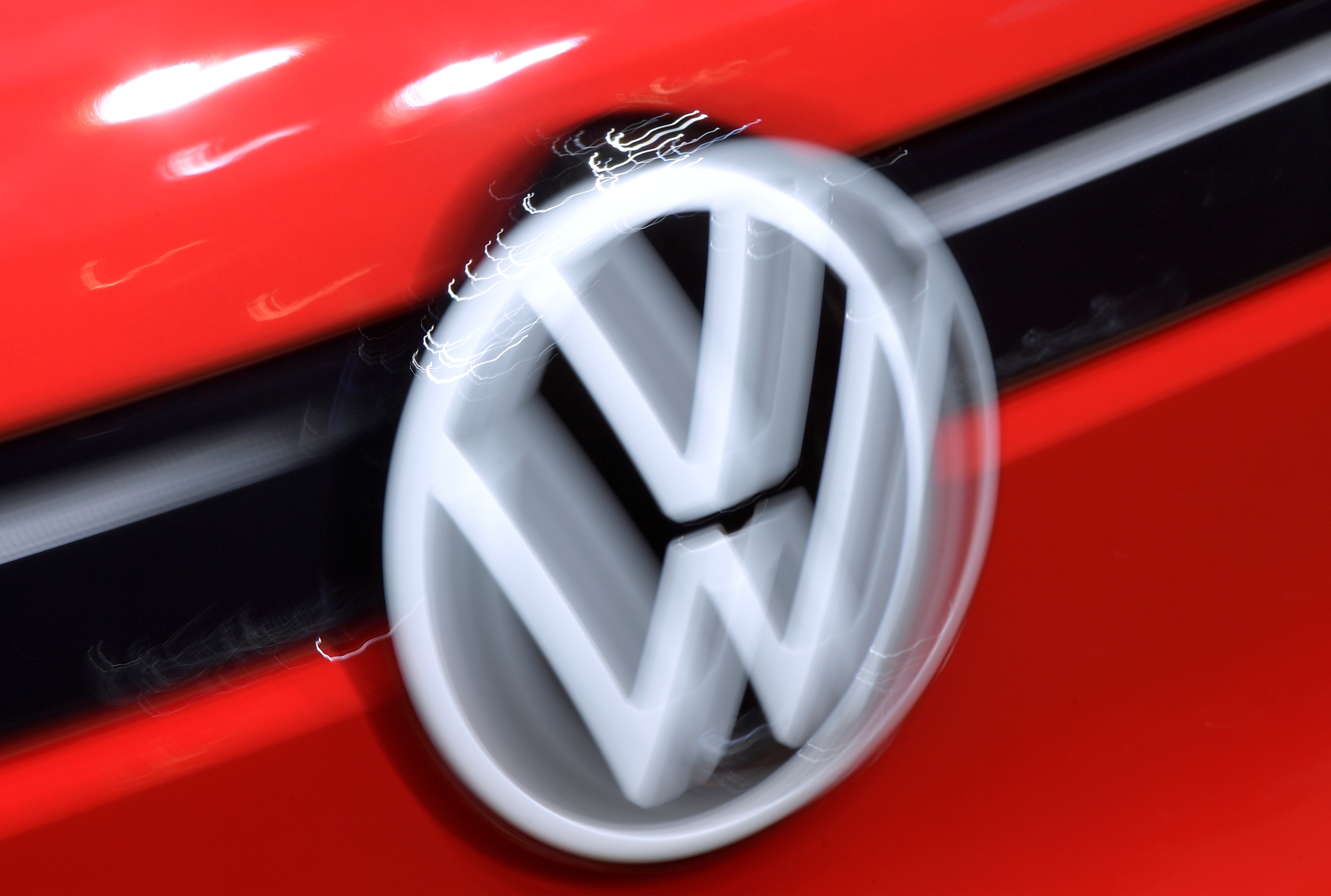 Taken with vario focussing, the sign of VW is seen as German carmaker Volkswagen presents its electric ID.5, an E-SUV in Dresden, Germany, November 3, 2021. REUTERS/Matthias Rietschel