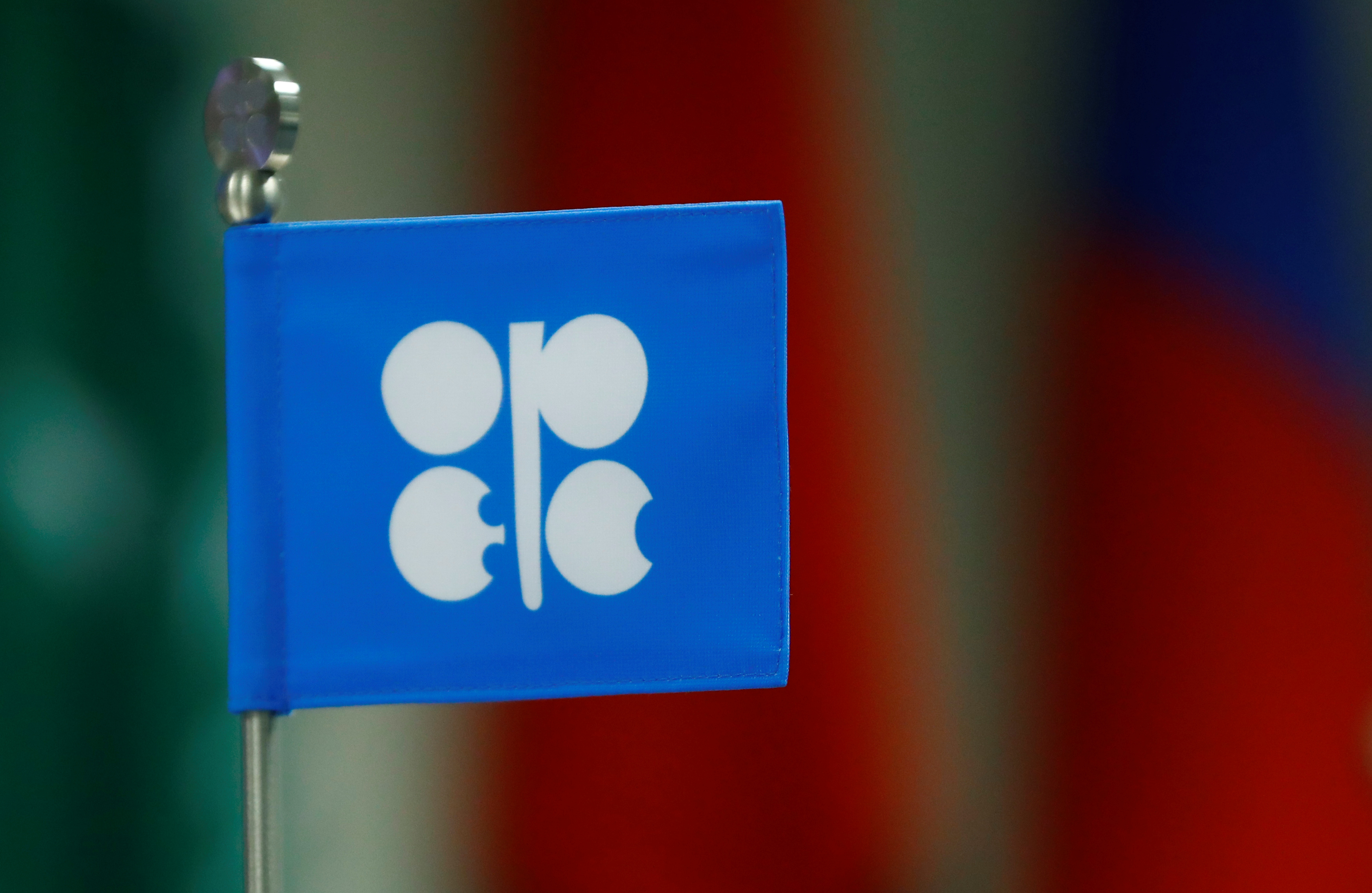A flag with the Organization of the Petroleum Exporting Countries (OPEC) logo is seen  during a meeting of OPEC and non-OPEC countries in Vienna