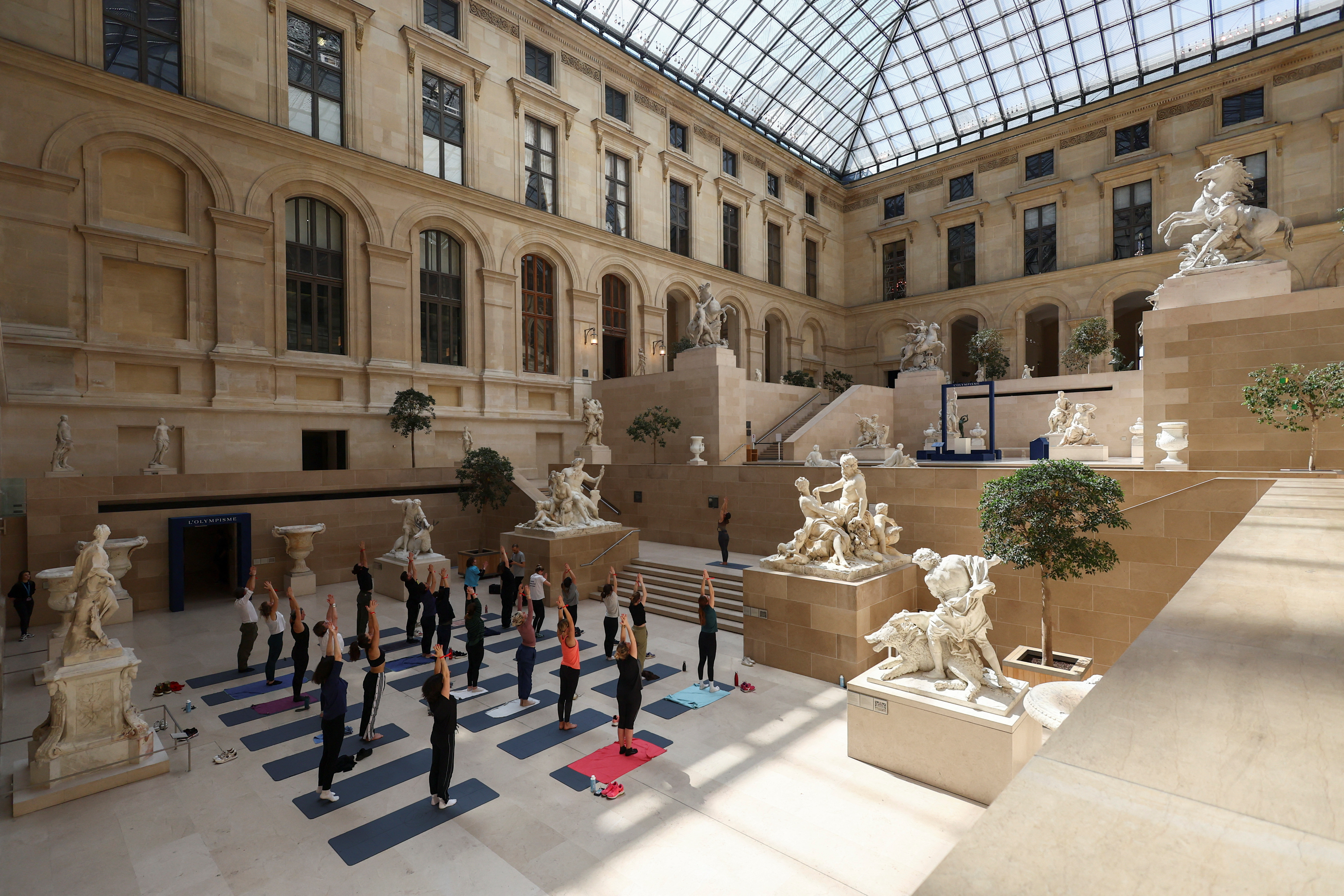 Run in the Louvre: museum visit nods to Olympic sports