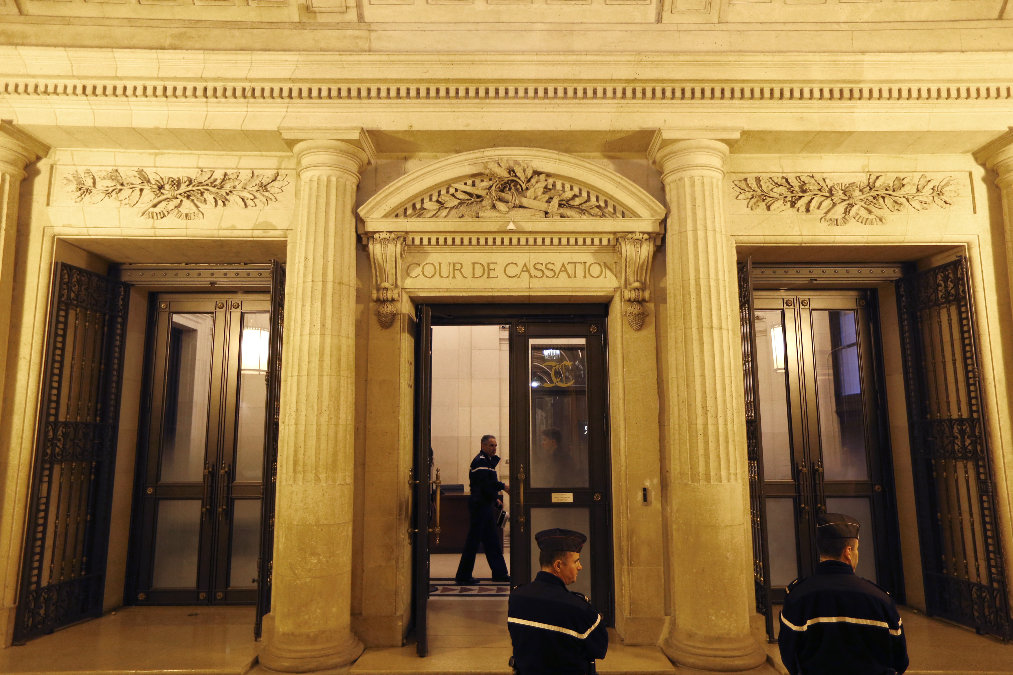 French gendarmes stand in front of France's highest court (Cour de Cassation) in Paris