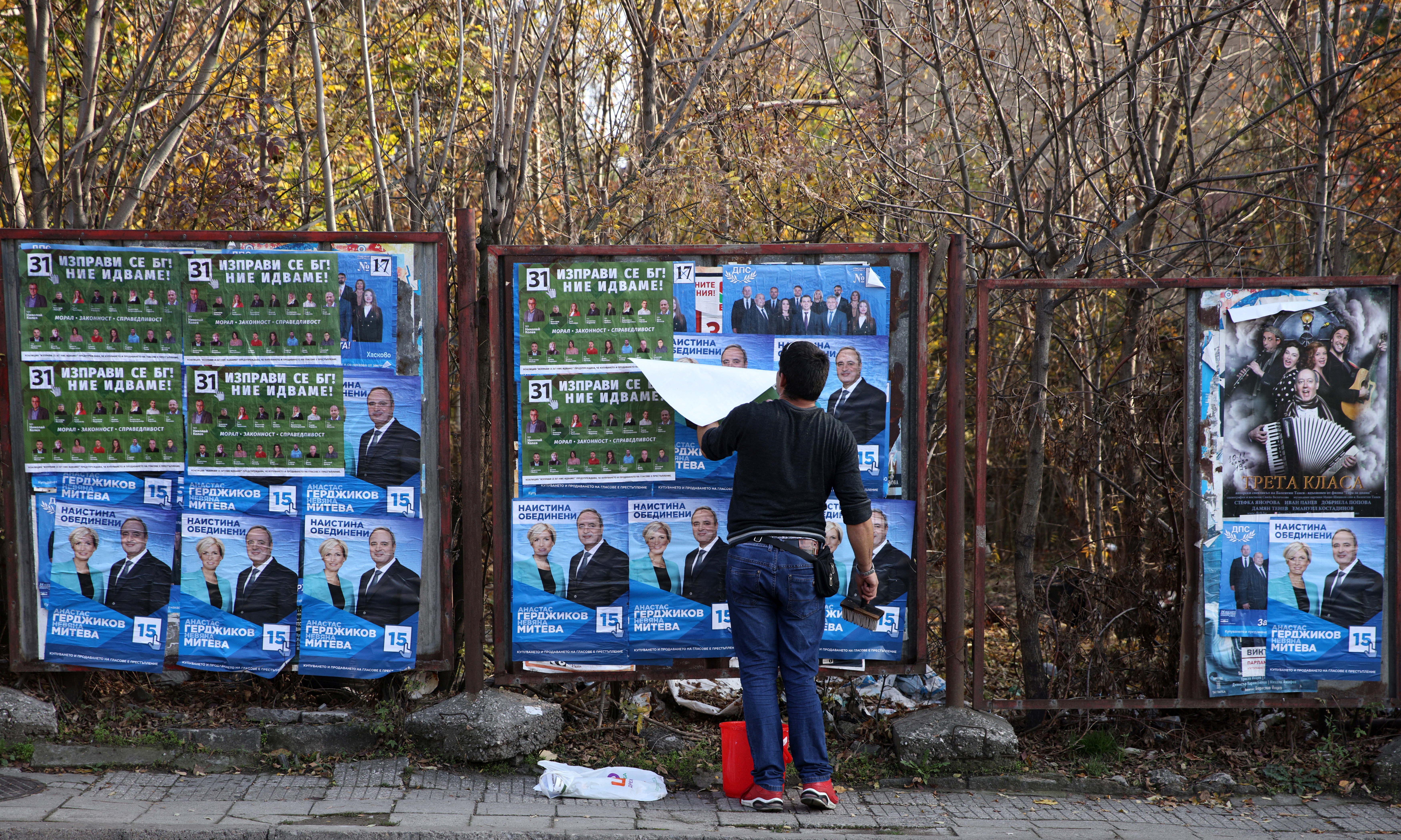 Man pastes election posters in Haskovo