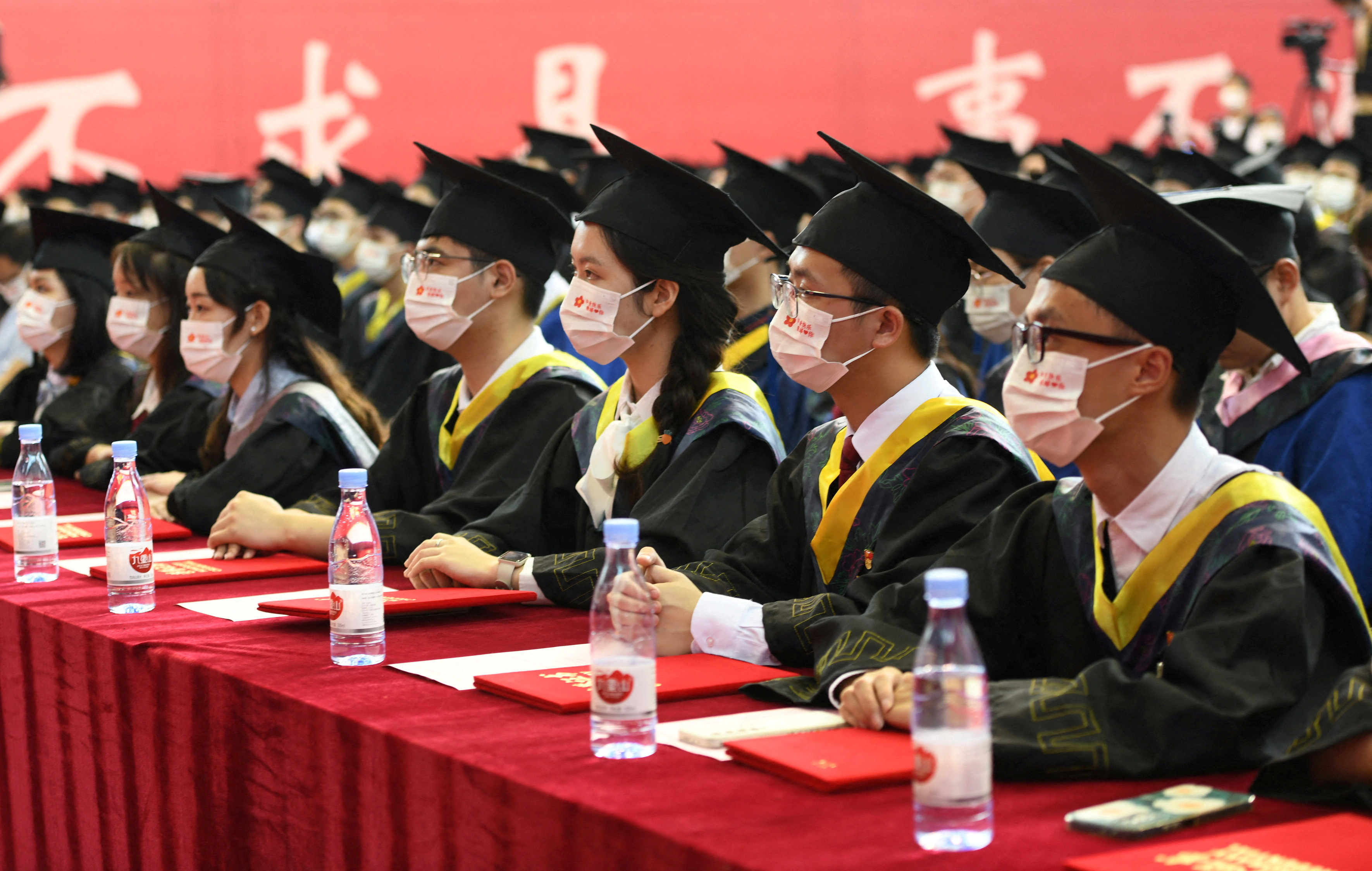 Record numbers of Chinese graduates enter worst job market in