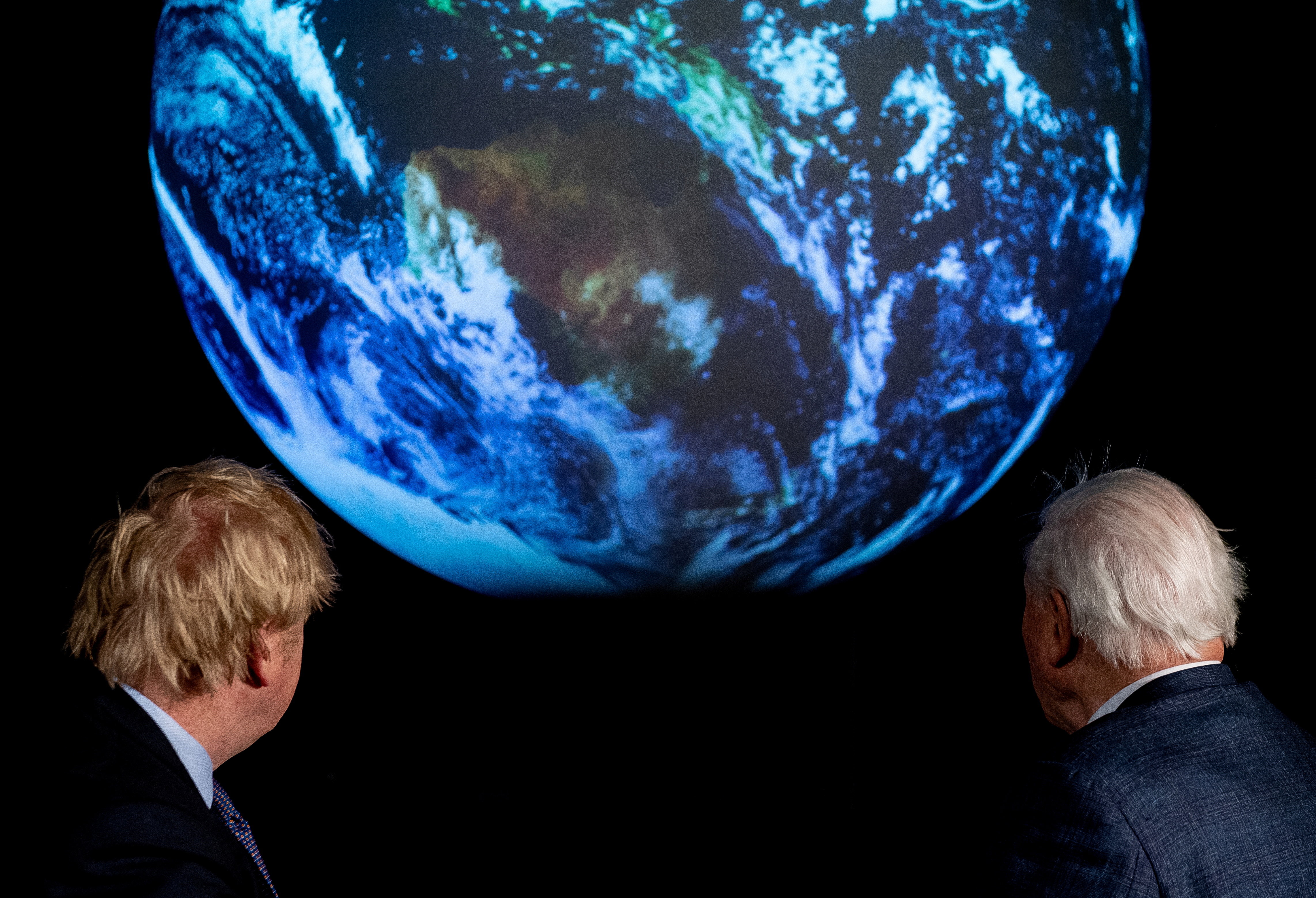 British Prime Minister Boris Johnson and David Attenborough attend a conference about COP26 UN Climate Summit, in London