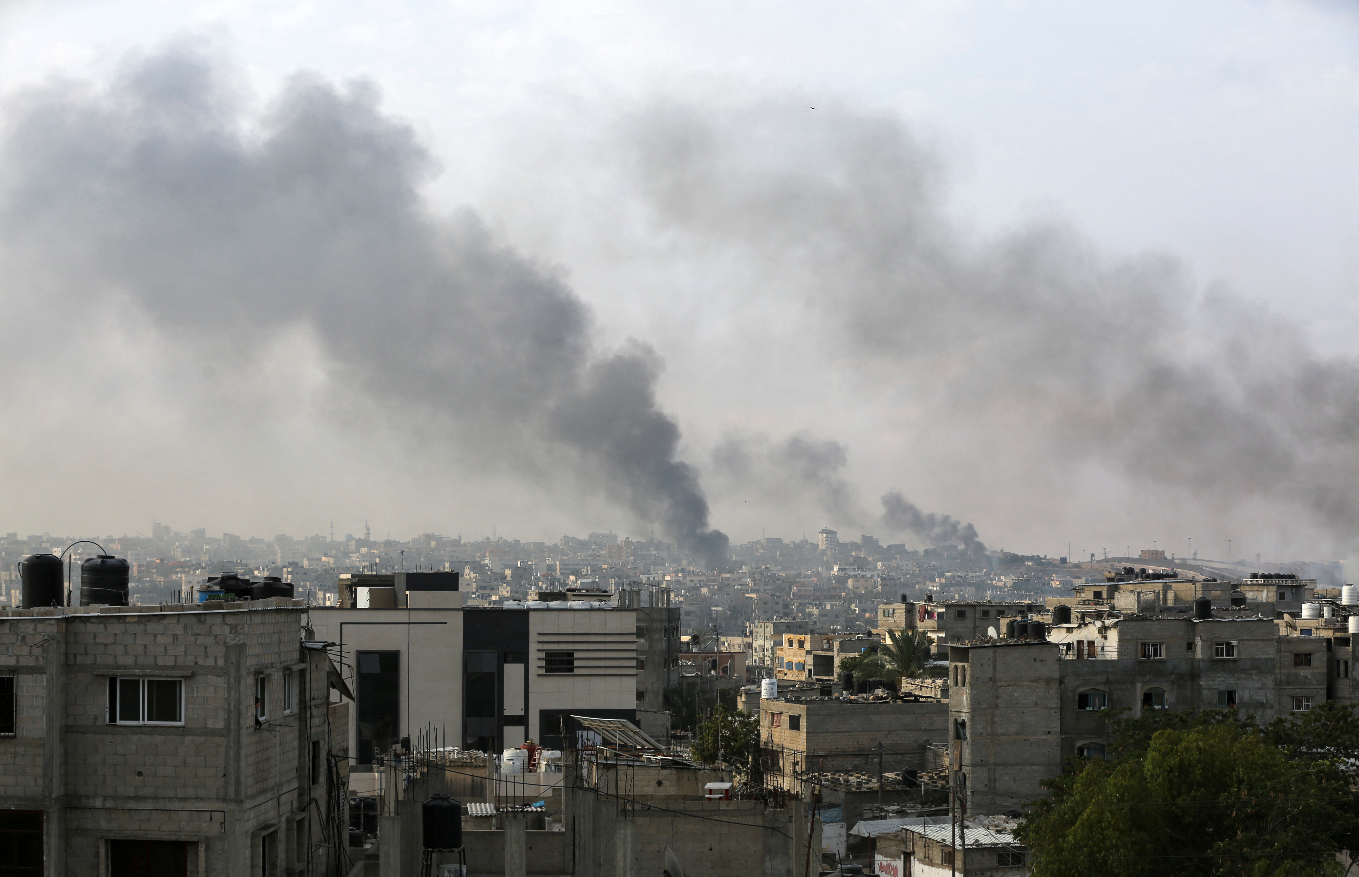 Smoke rises following Israeli strikes during an Israeli military operation, in Rafah