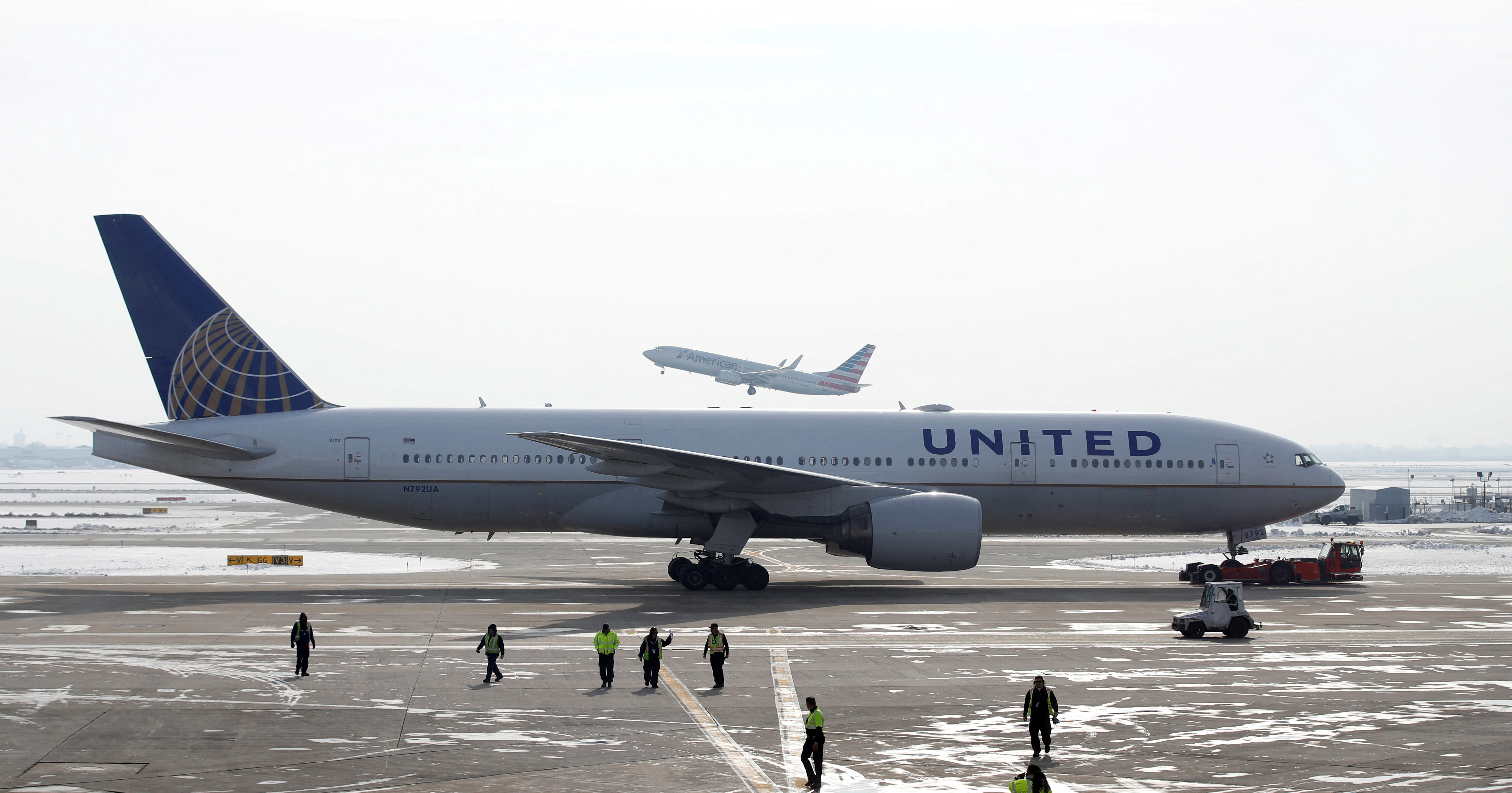 A United Airlines Boeing 777 plane is towed at O'Hare International Airport in Chicago