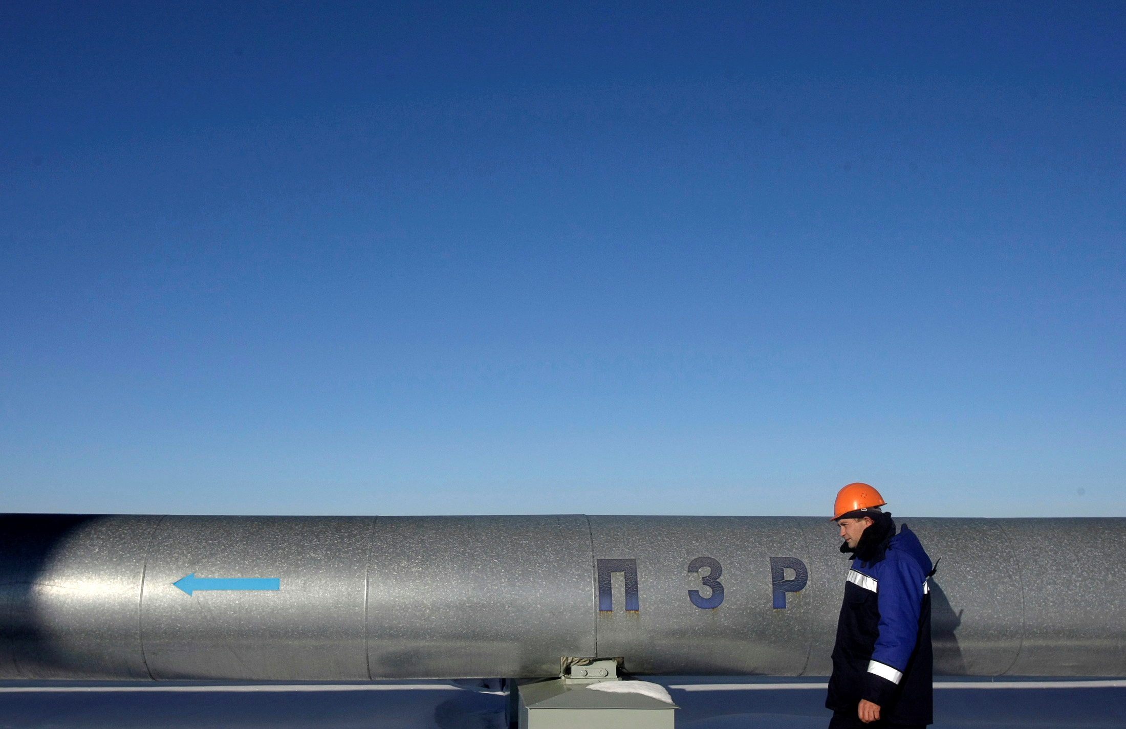 Employee walks at Russian gas export monopoly Gazprom's Sudzha pumping station