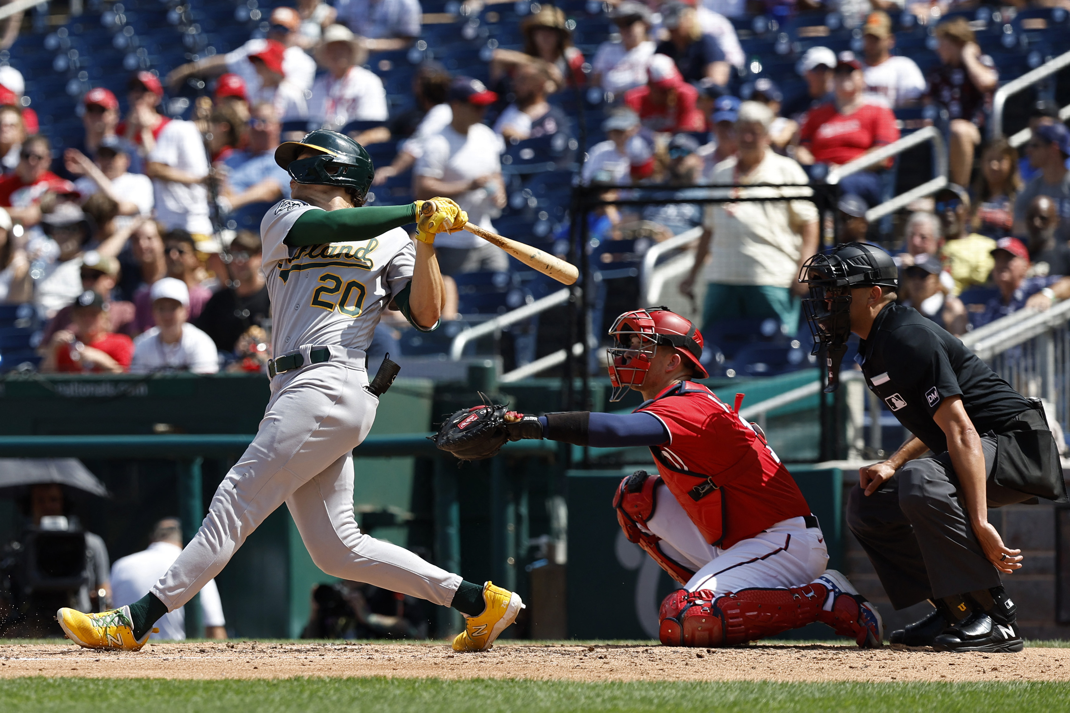 Seattle Mariners' J.P. Crawford holds a trident after hitting a solo home  run against the Oakland Athletics during the ninth inning of a baseball  game Tuesday, Sept. 19, 2023, in Oakland, Calif. (