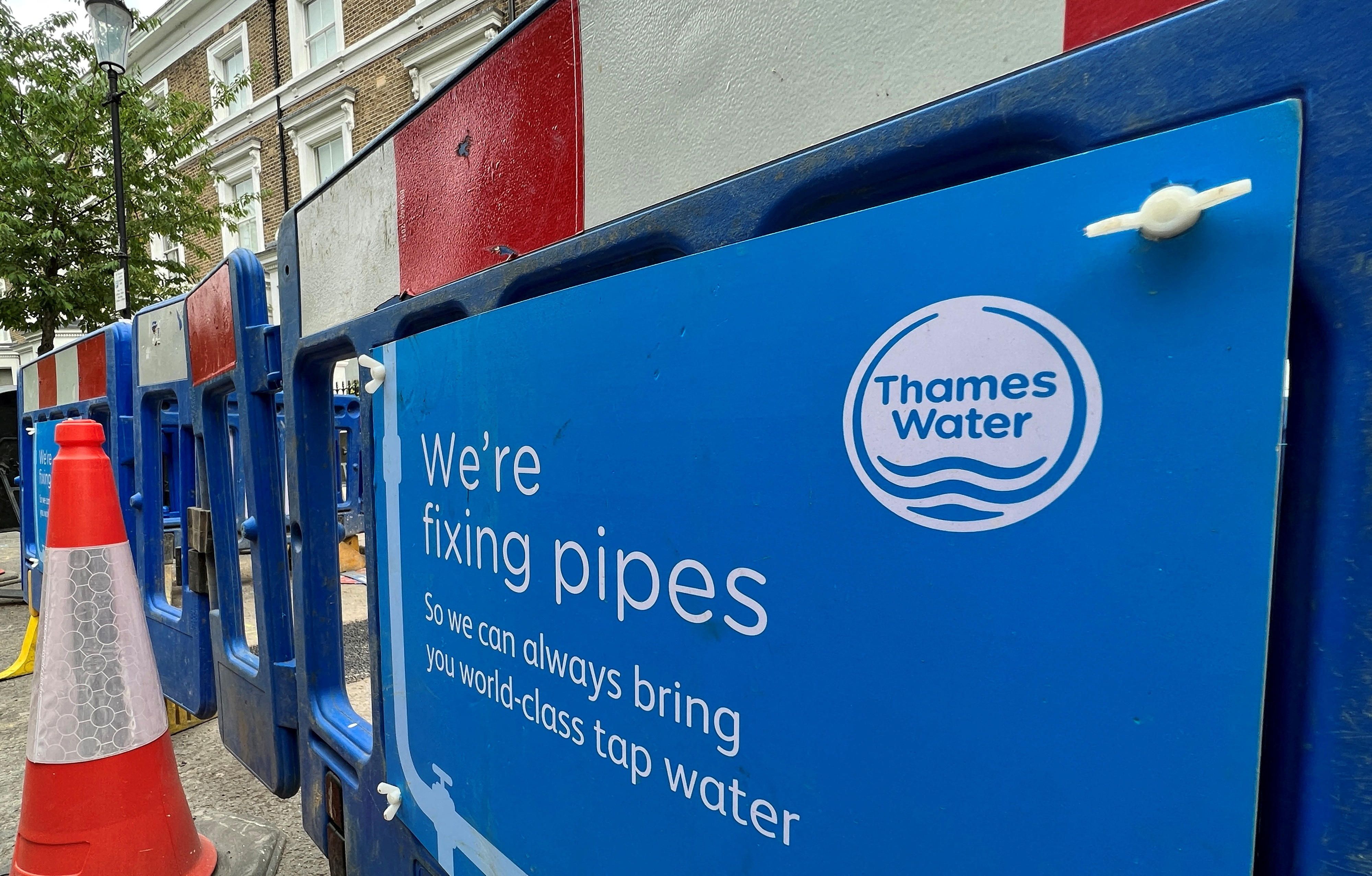 Signage for Thames Water at a repair site in London