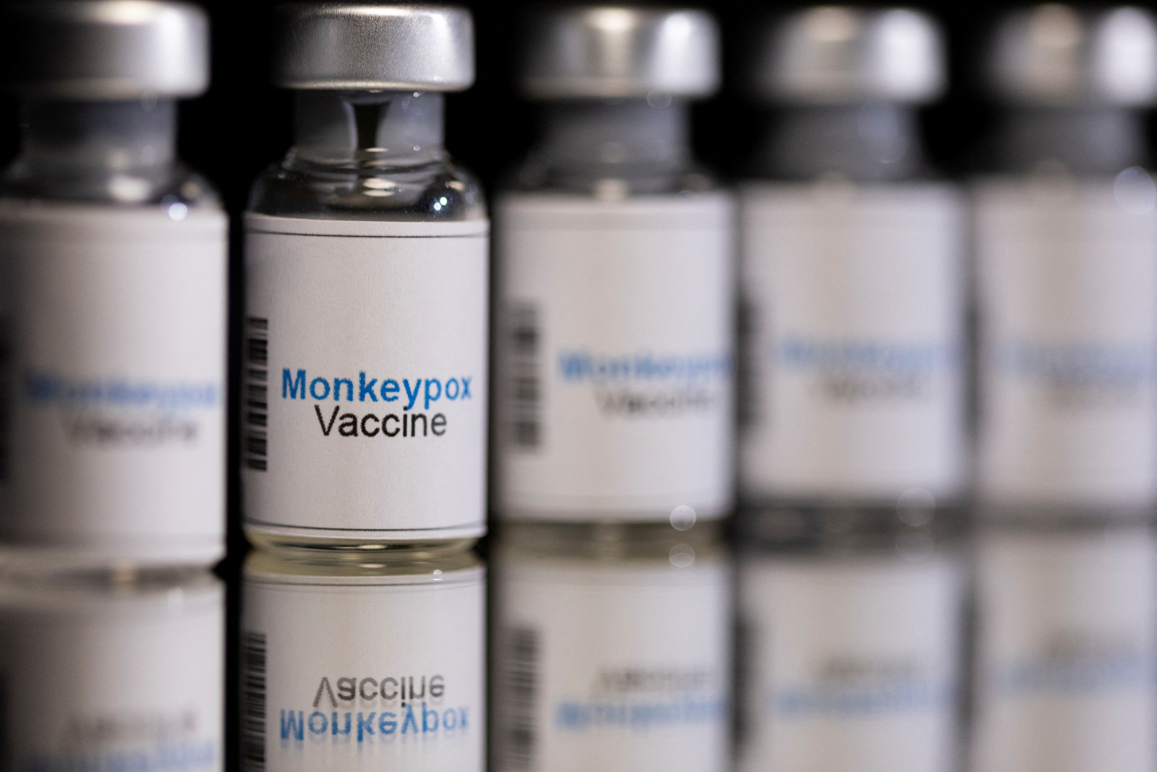 Illustration shows mock-up vials labeled 