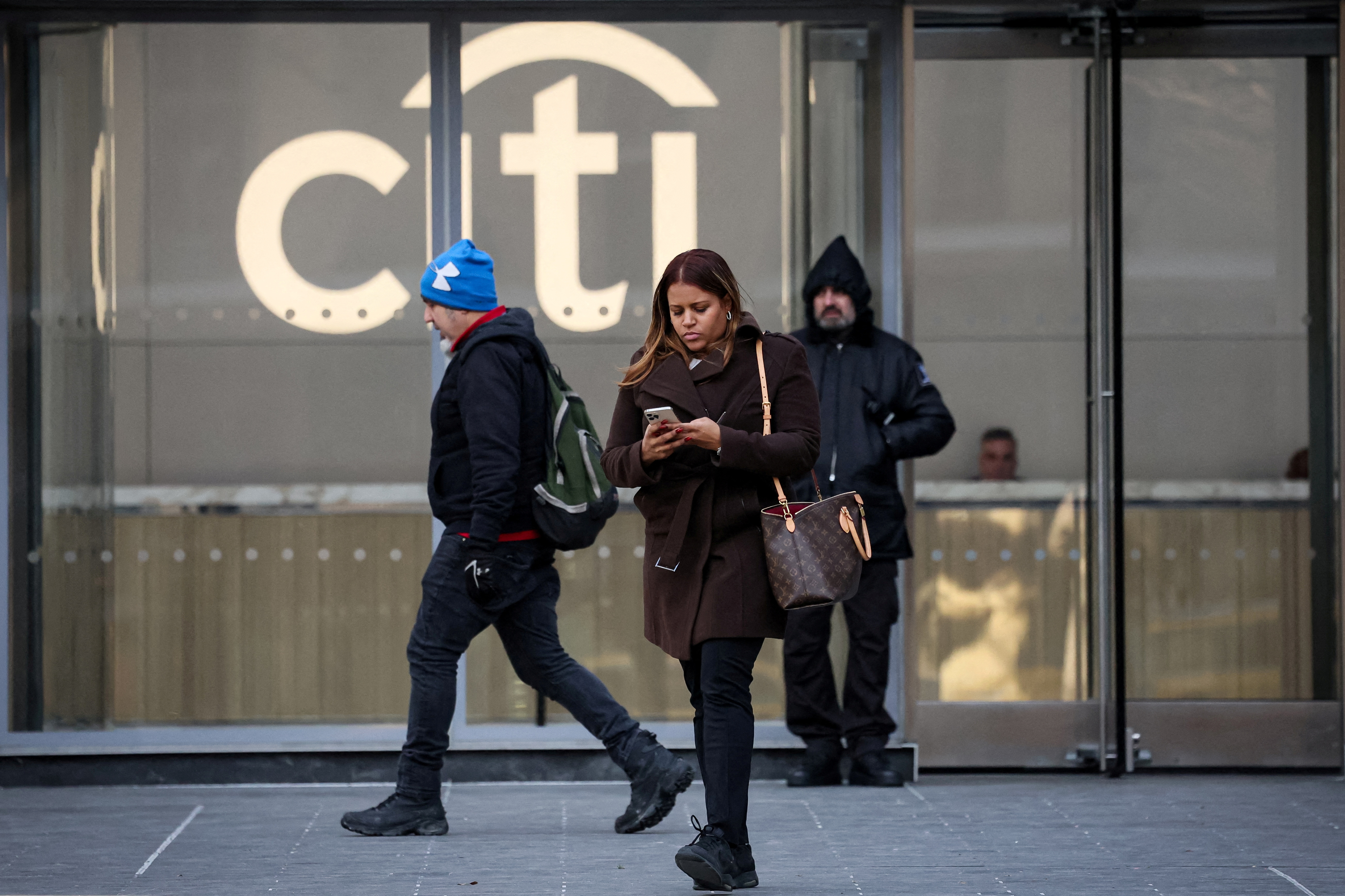 Workers exit the Citi Headquarters in New York