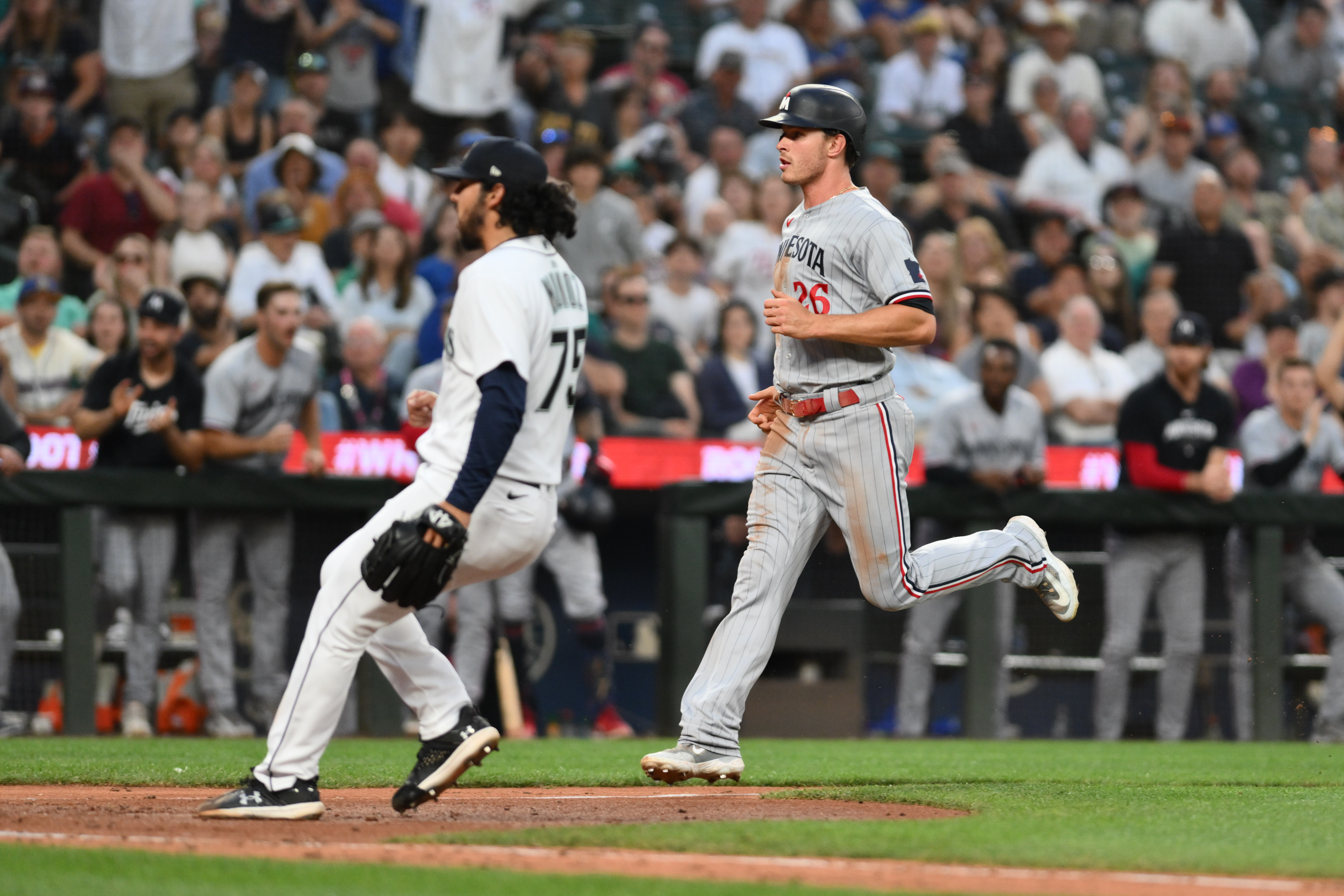 Twins double up Mariners, extend post-break surge