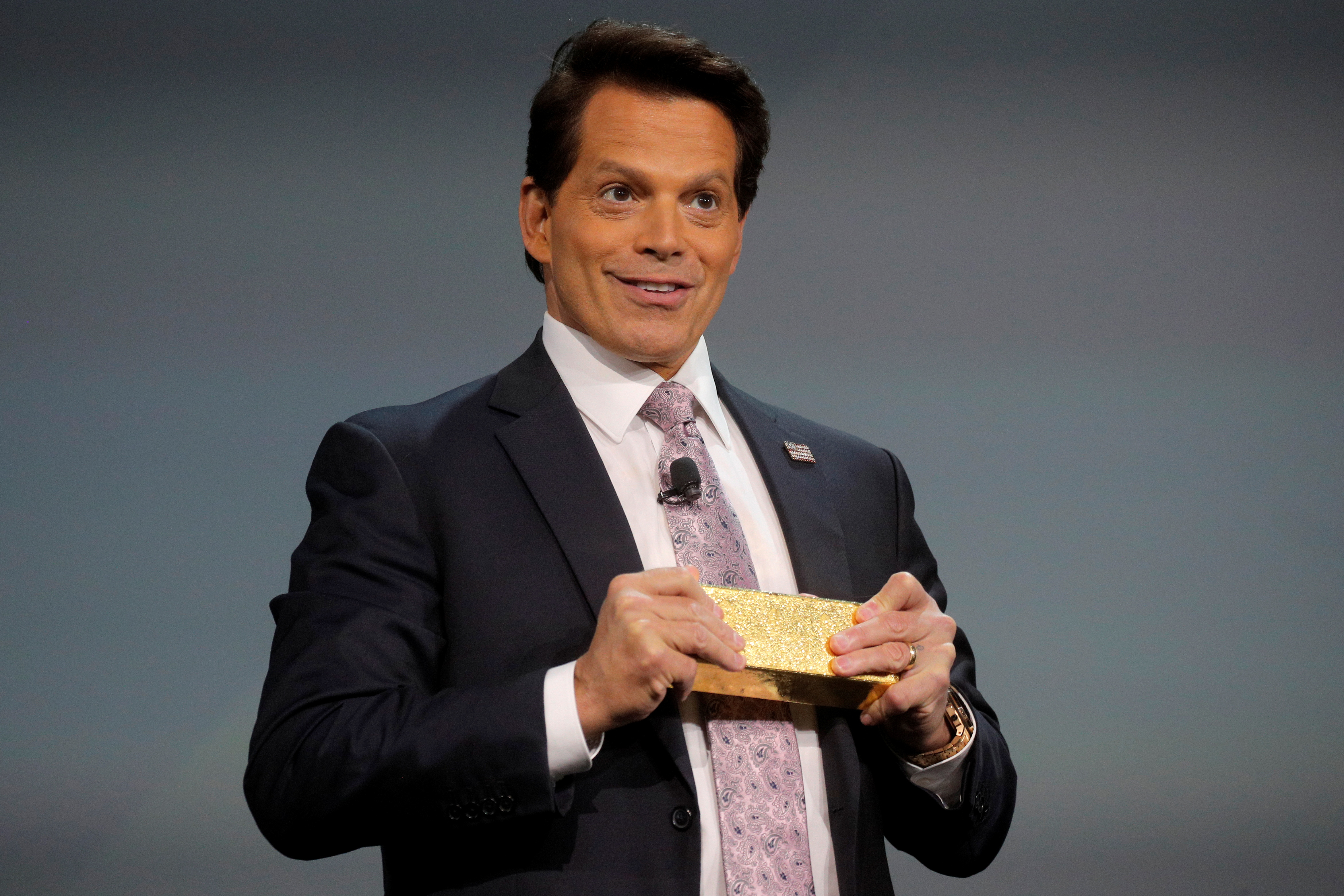 Anthony Scaramucci, Founder & Managing Partner of SkyBridge Capital, holds a gold bar while hosting the Skybridge Capital SALT New York 2021 conference in New York