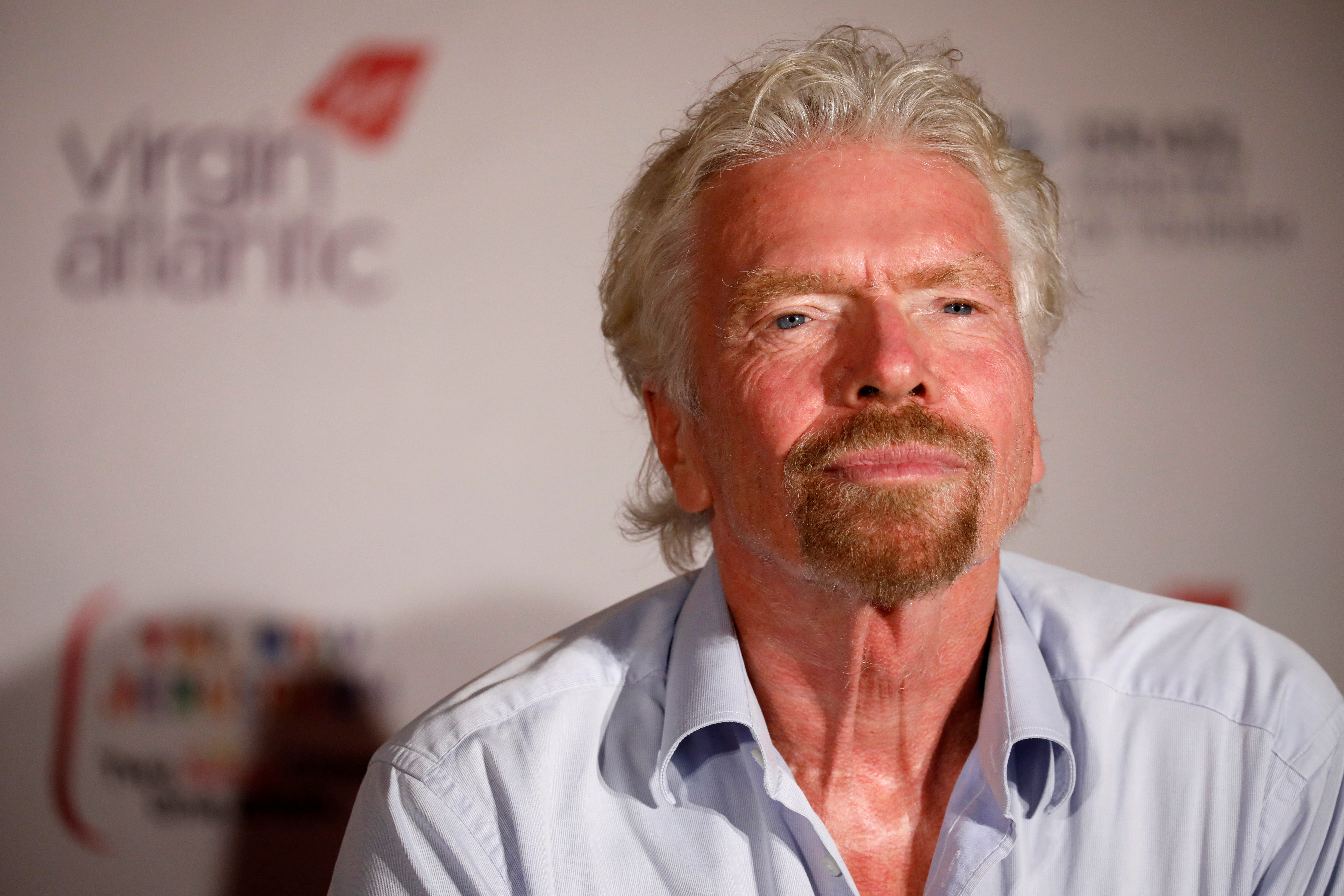 Virgin's Richard Branson attends a news conference after landing at the Ben Gurion international airport near Tel Aviv