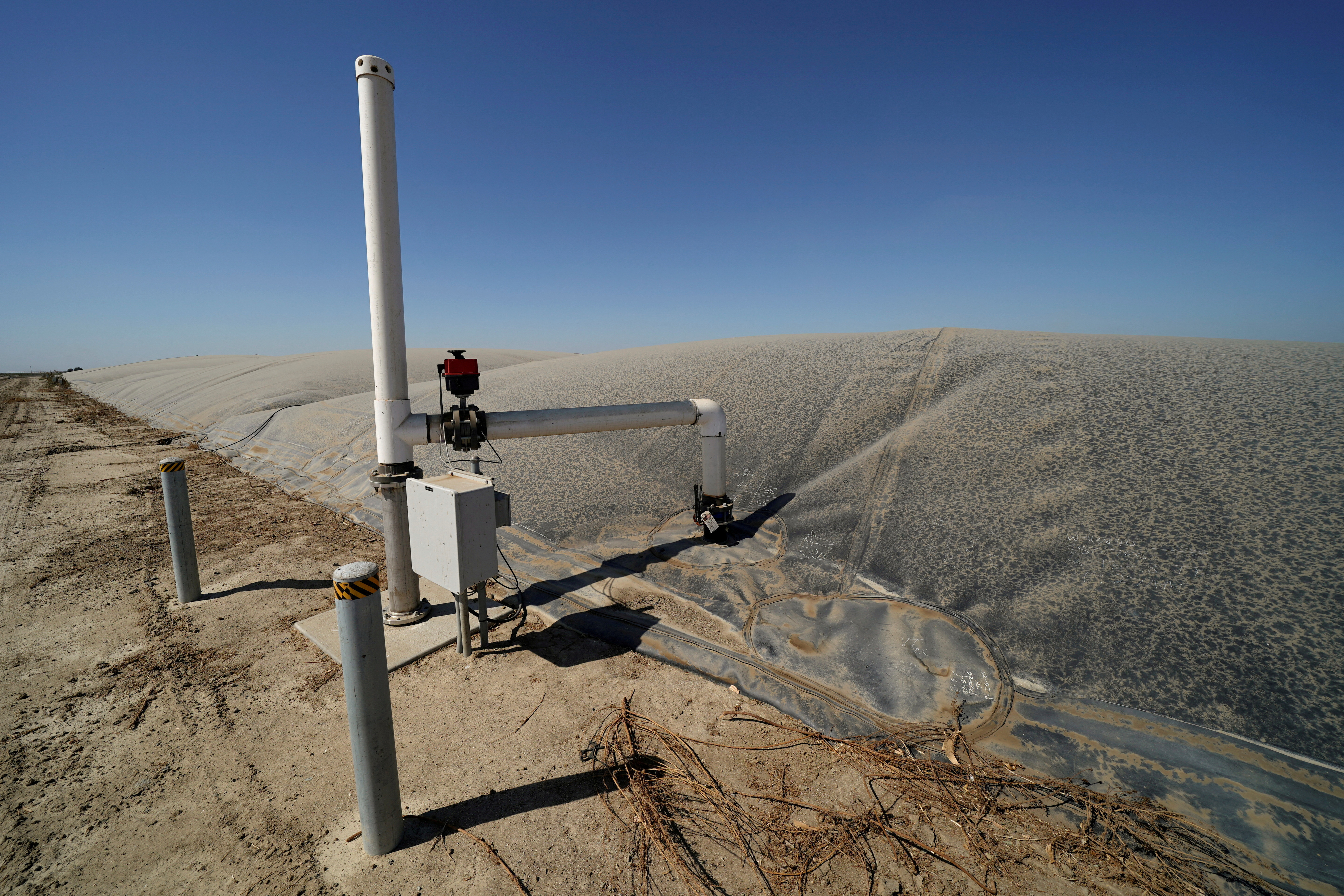 A methane collecting dome that covers one of Airoso Circle A Dairy's waste collecting ponds is shown in Pixley, California
