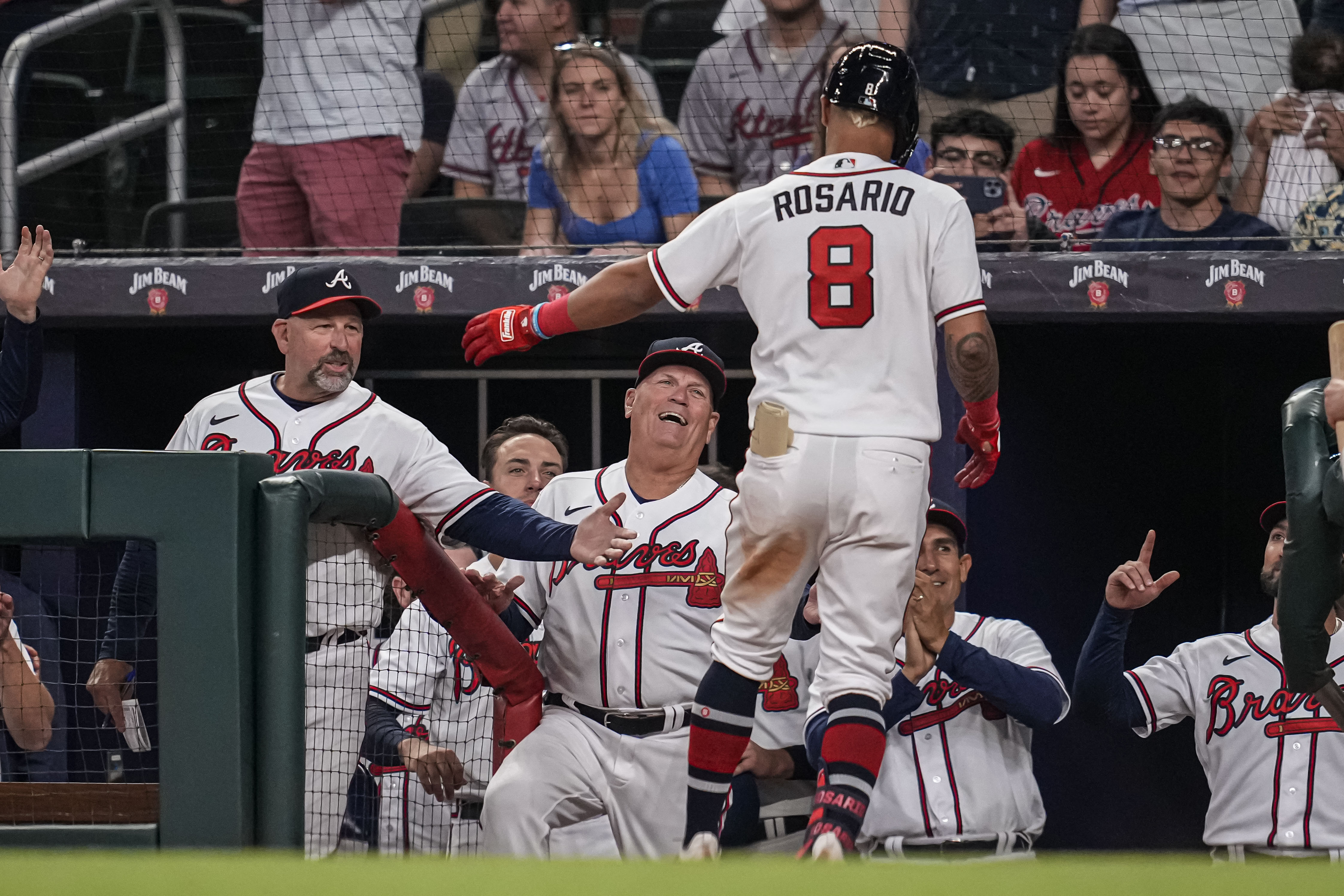 Atlanta Braves' Eddie Rosario celebrates his solo home run against