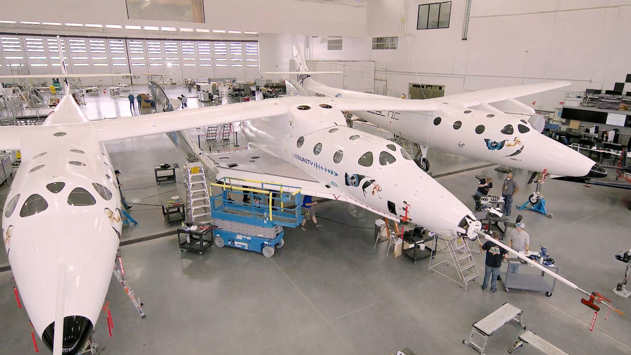 Virgin Galactic's passenger rocket plane, the VSS Unity, is seen in its hangar