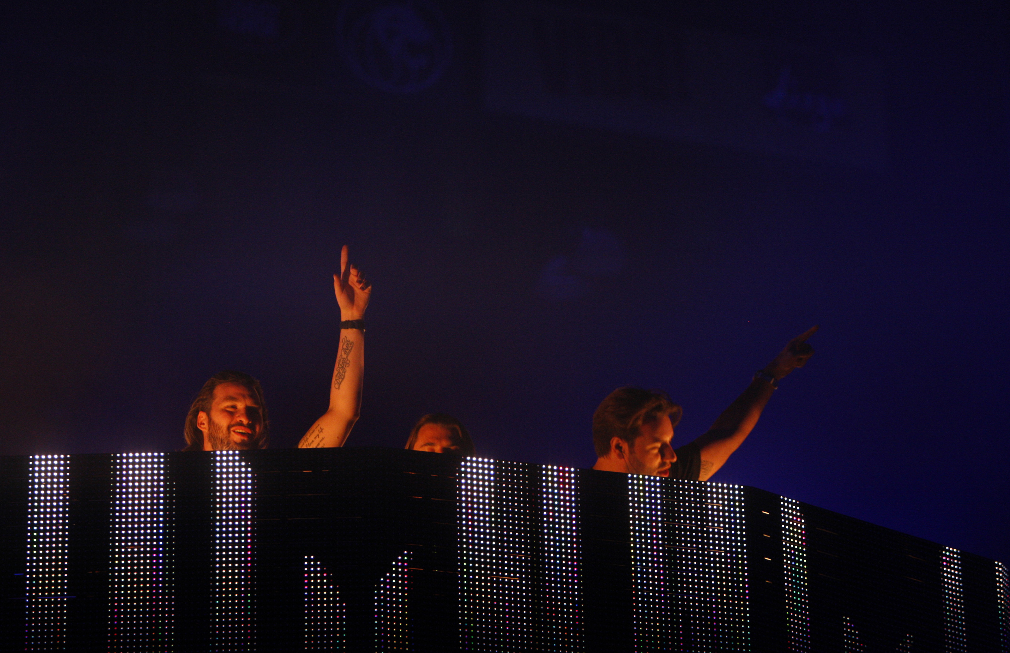 Members of Swedish House Mafia perform during the 2012 iHeartRadio Music Festival in Las Vegas