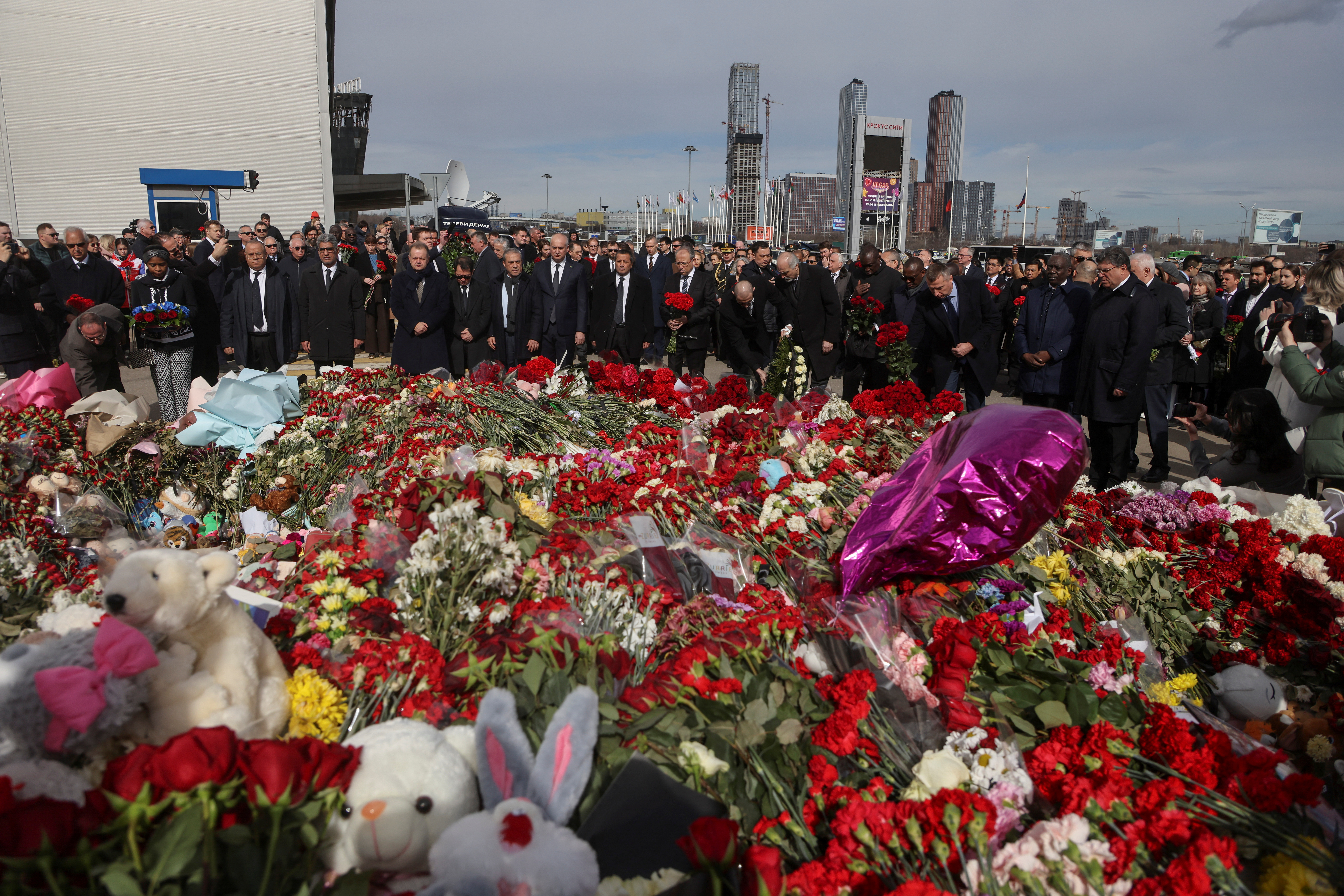 Ambassadors of foreign diplomatic missions lay flowers at the memorial for the victims of the attack at Crocus City Hall