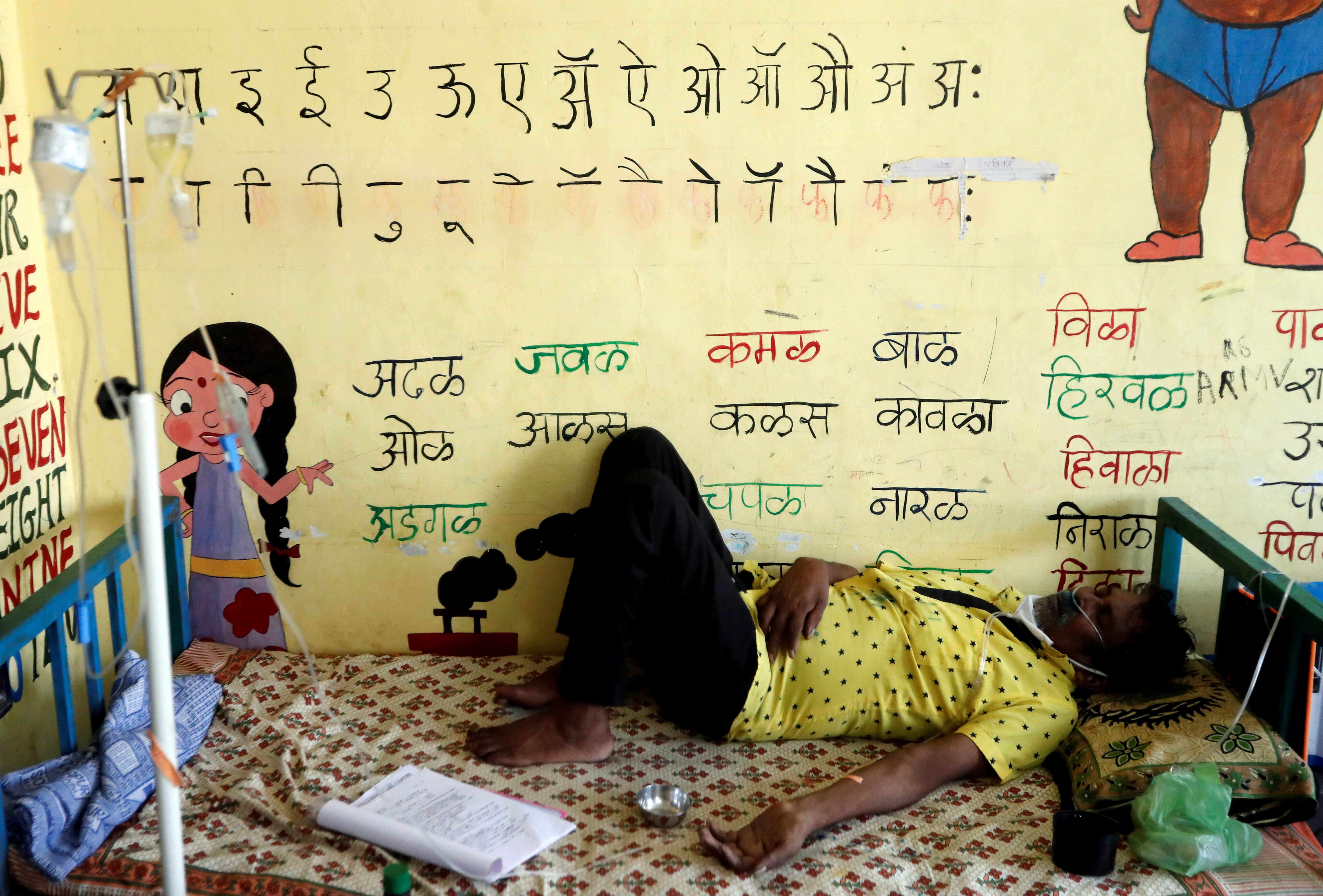 Patients are treated at classroom turned COVID-19 care facility on outskirts of Mumbai