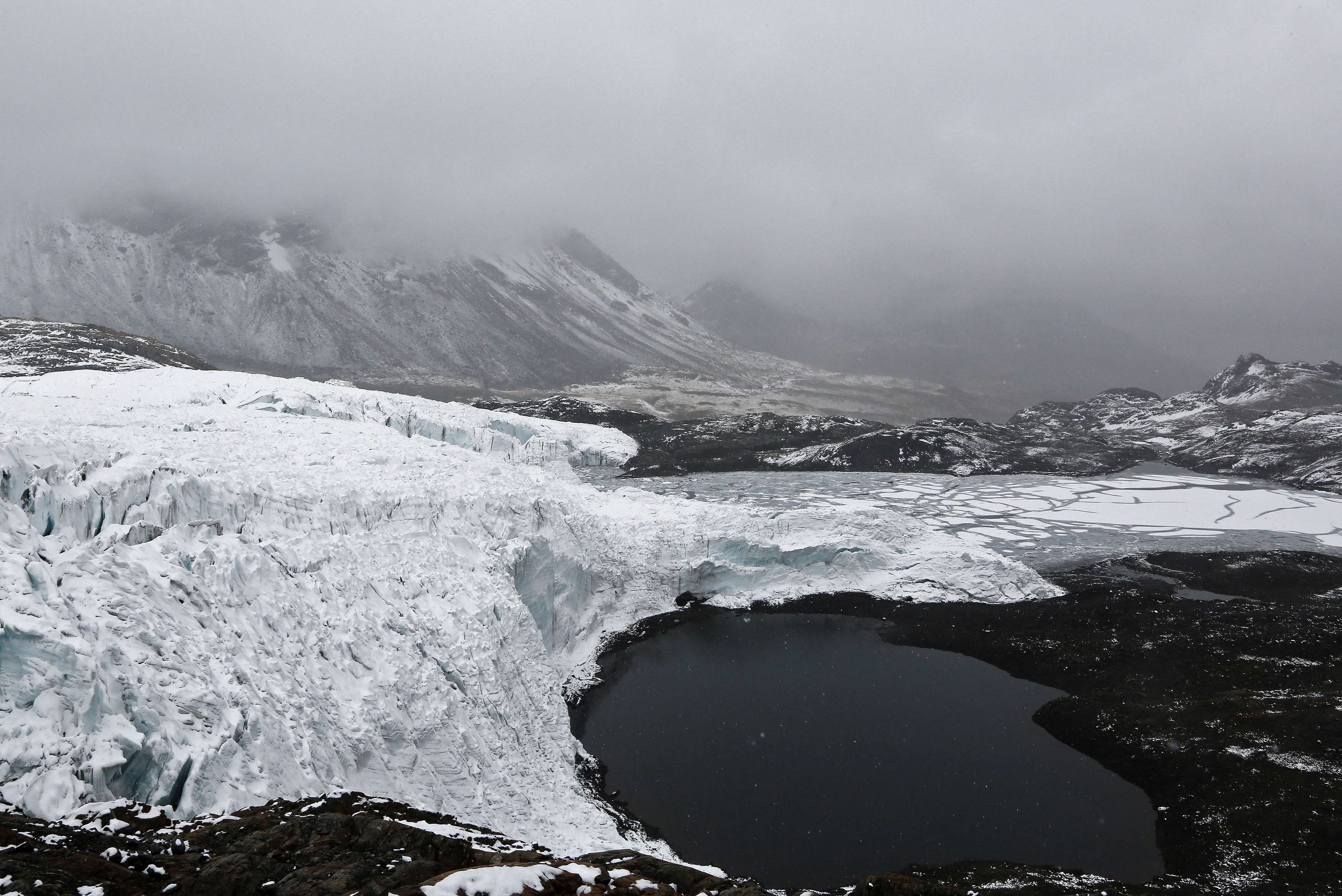 A view of the lake formed by meltwater from the Pastoruri glacier, as seen from atop the glacier in Huaraz