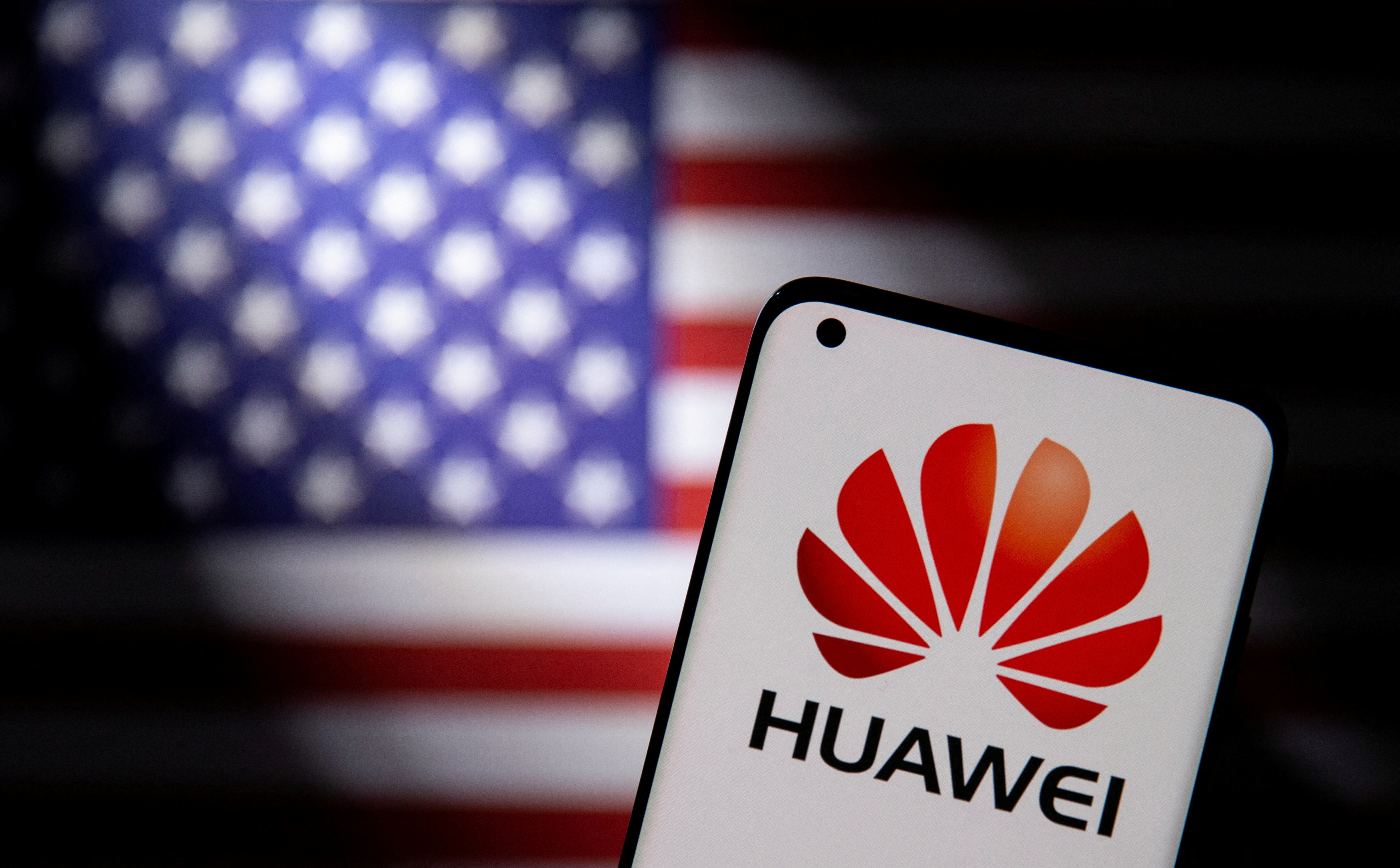 U.S. probes China's Huawei over near silos | Reuters
