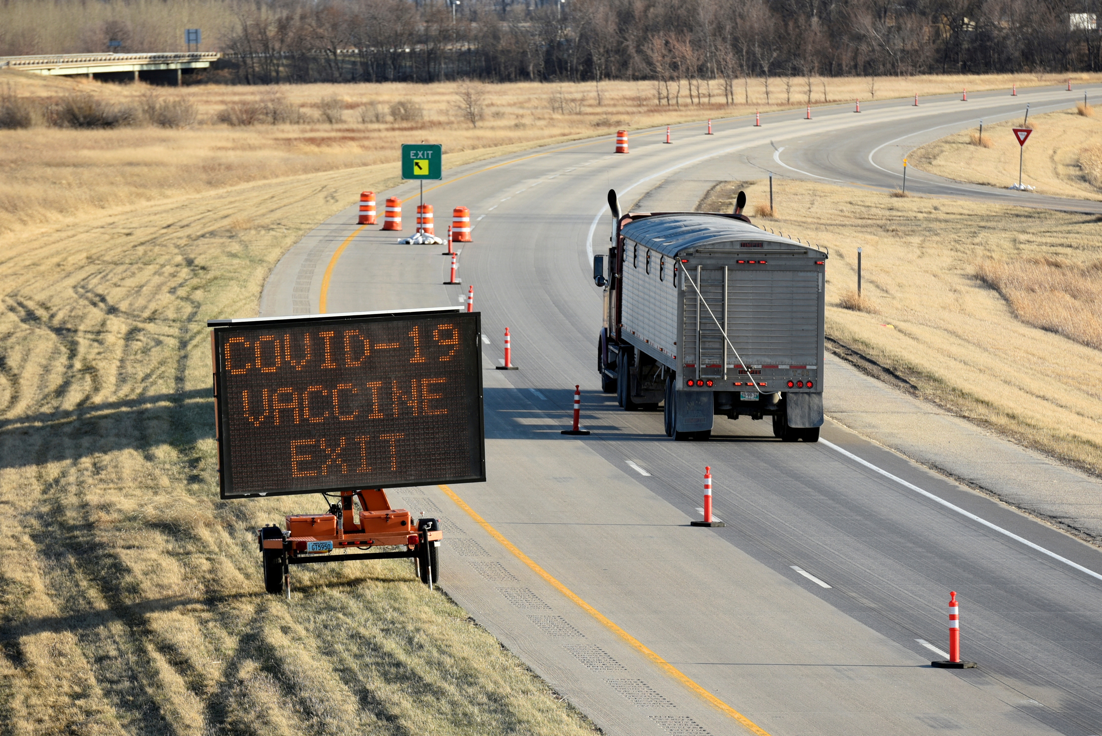 Manitoba-based truckers, transporting goods to and from the United States, are being vaccinated against coronavirus disease (COVID-19) as part of a deal between the Canadian province and the state of North Dakota, at a rest stop near Drayton, North Dakota, U.S. April 22, 2021.   REUTERS/Dan Koeck