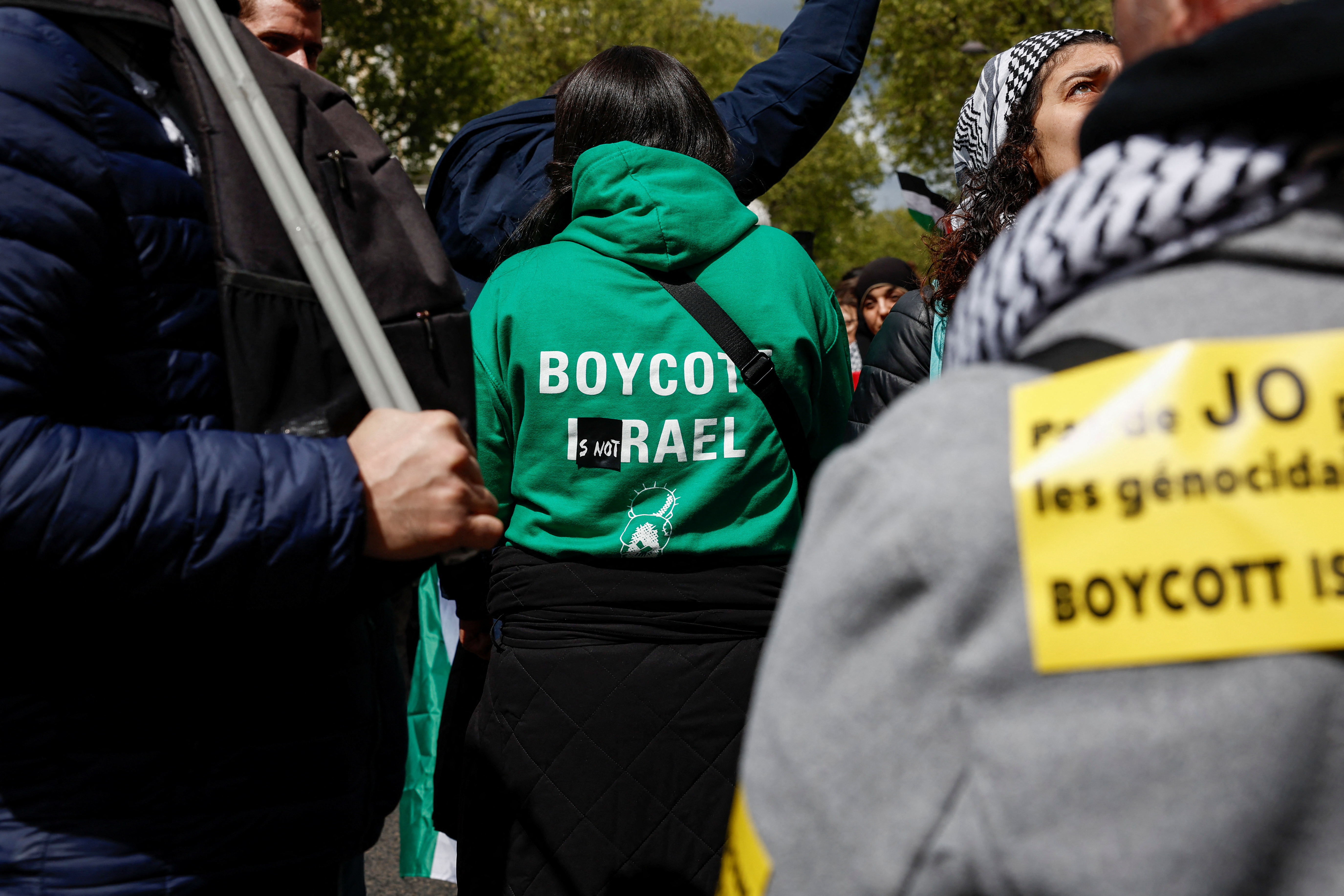 People march in a protest against racism, Islamophobia and the protection of children, in Paris