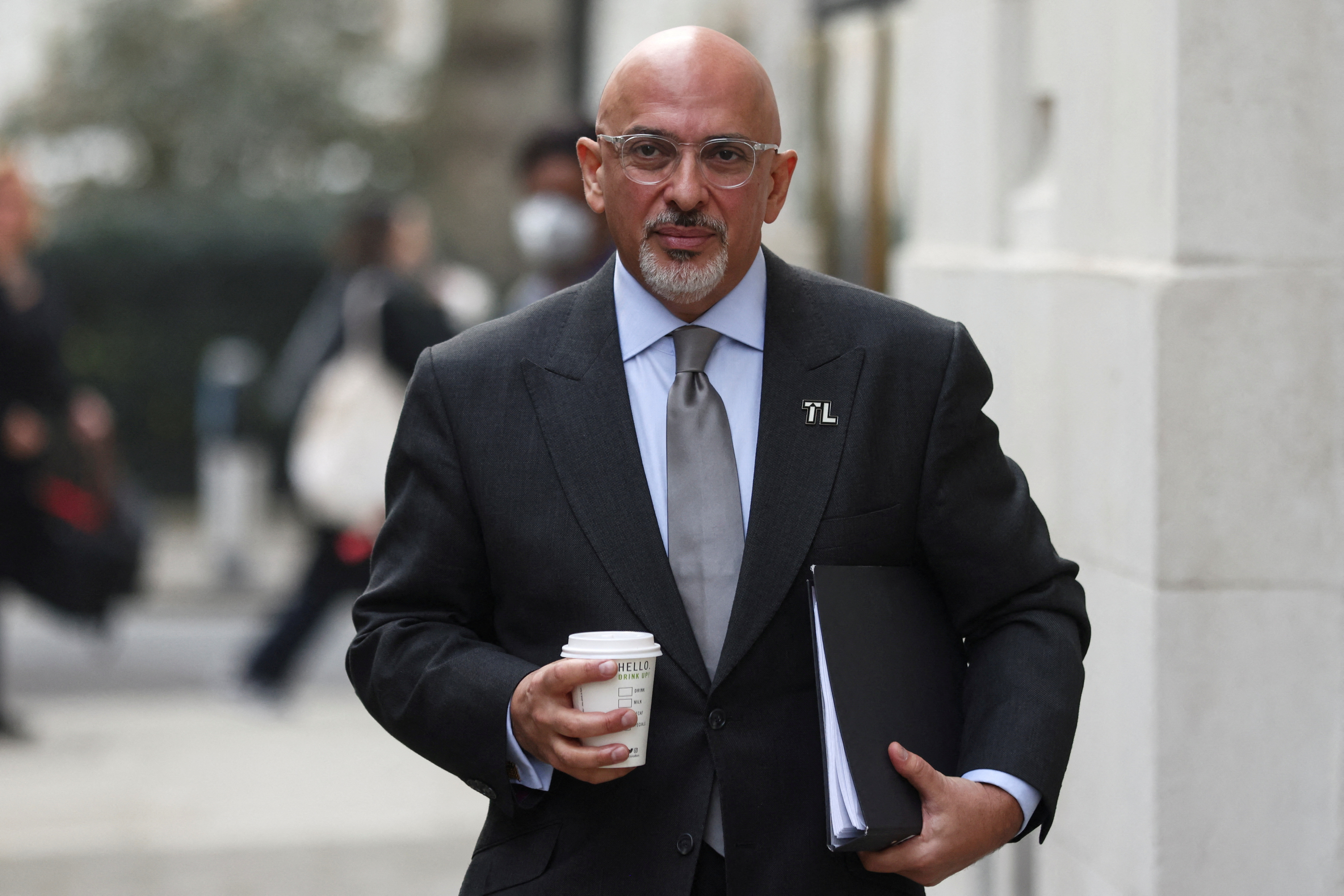 British Education Secretary Nadhim Zahawi leaves after media interview in London