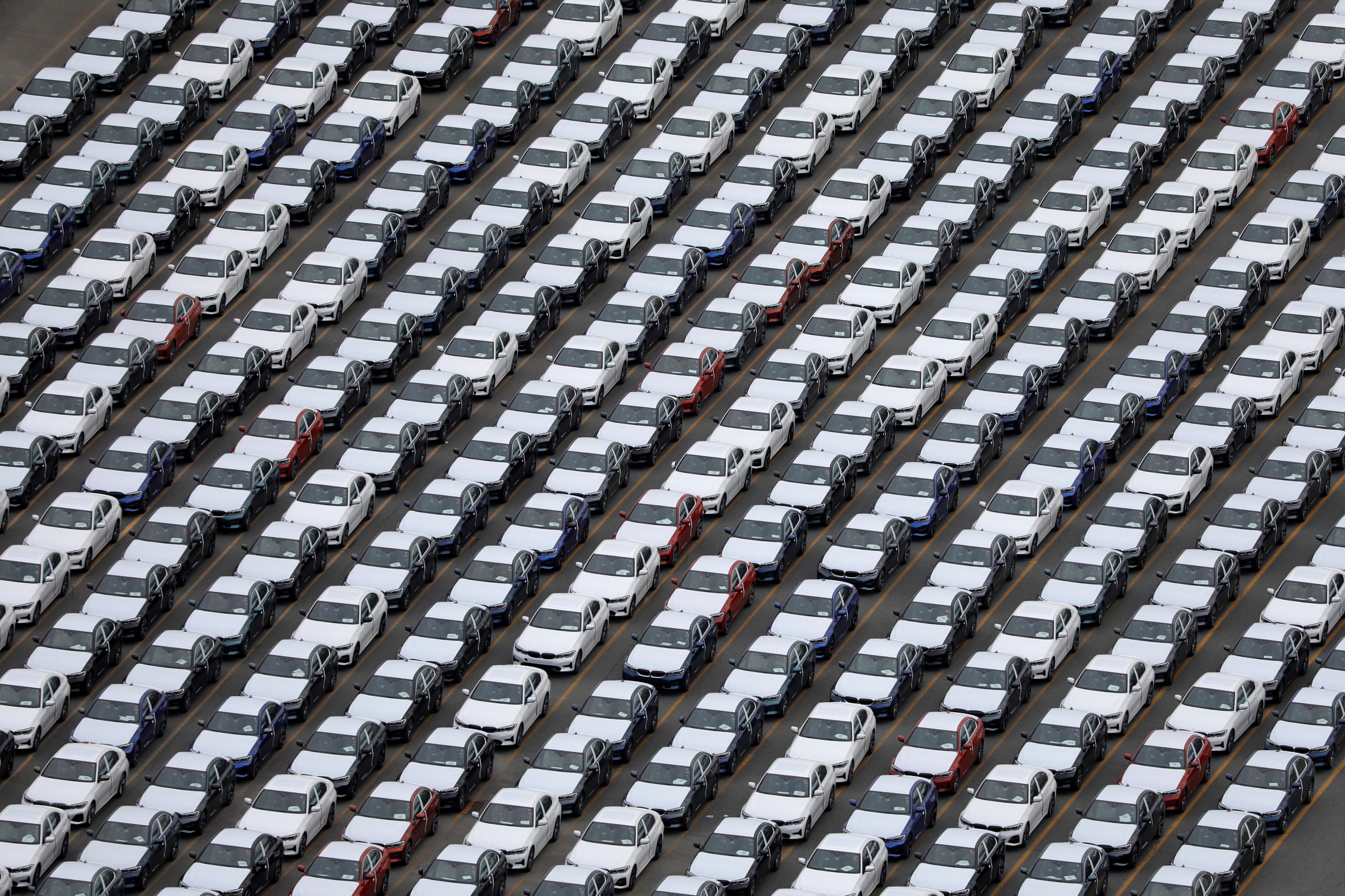 Cars are seen parked at the port in Bayonne, New Jersey