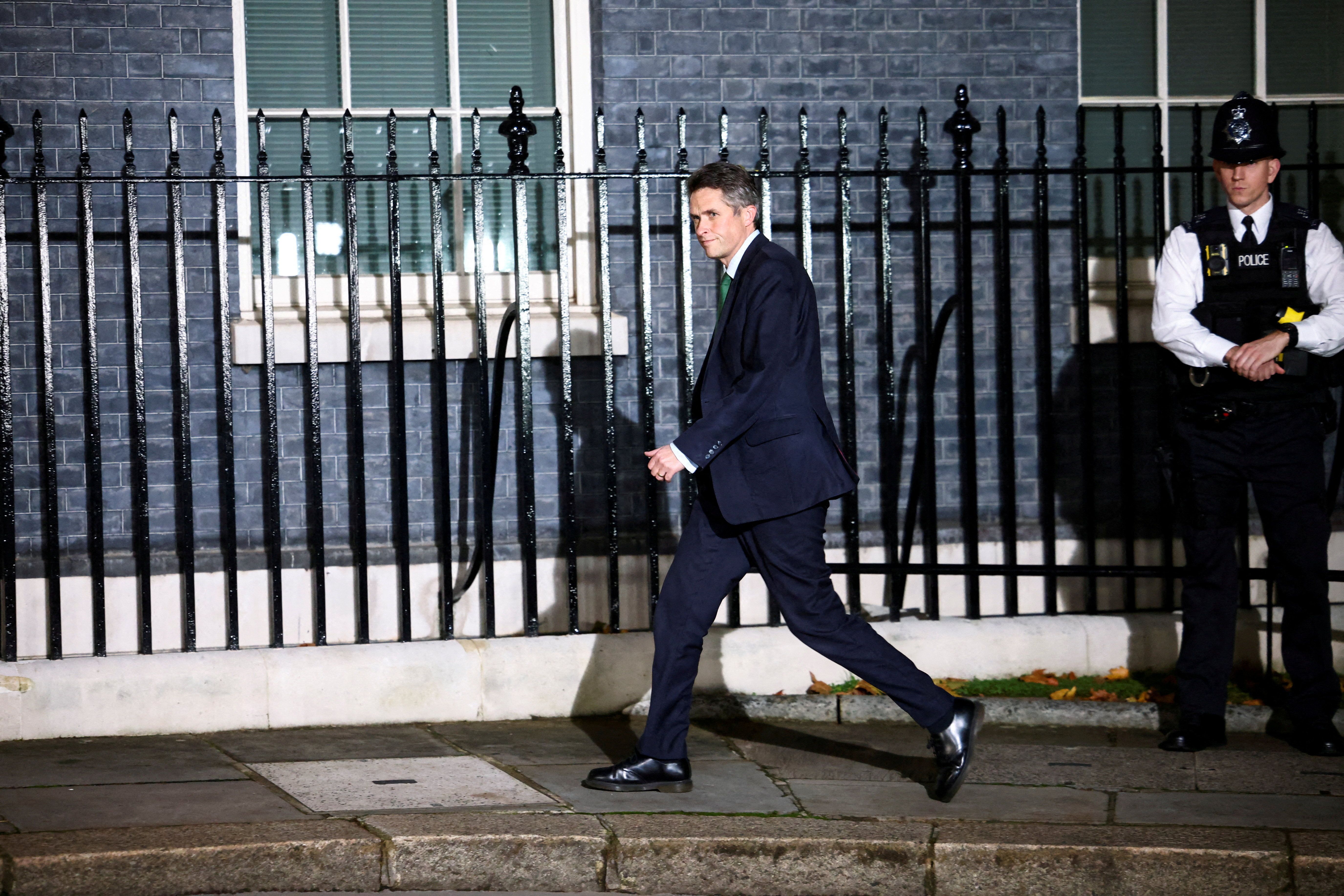 Gavin Williamson walks outside Number 10 Downing Street in London
