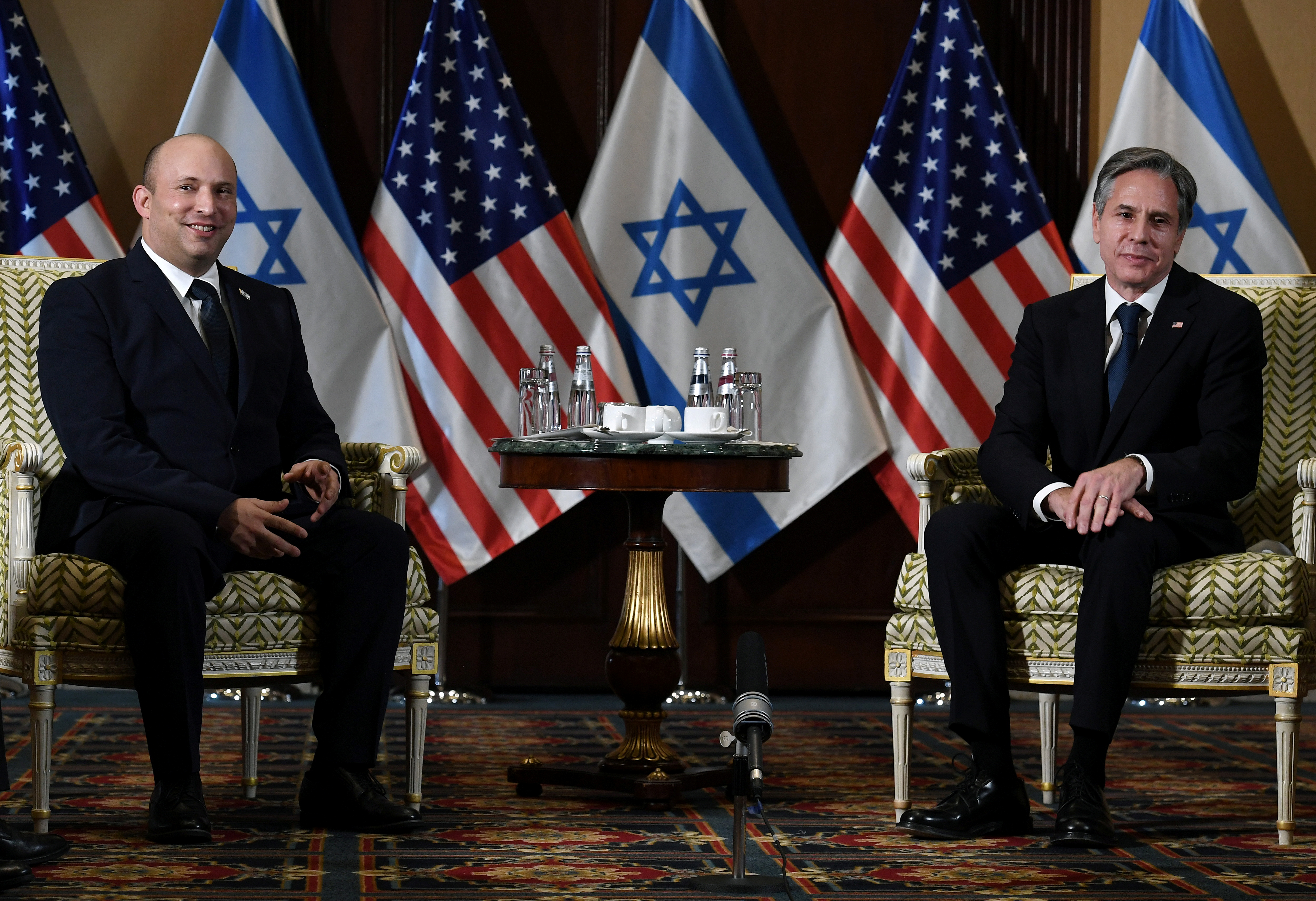U.S. Secretary of State Antony Blinken meets with Israeli Prime Minister Naftali Bennett at the Willard Hotel in Washington, D.C., U.S. August 25, 2021. Olivier Douliery/Pool via REUTERS