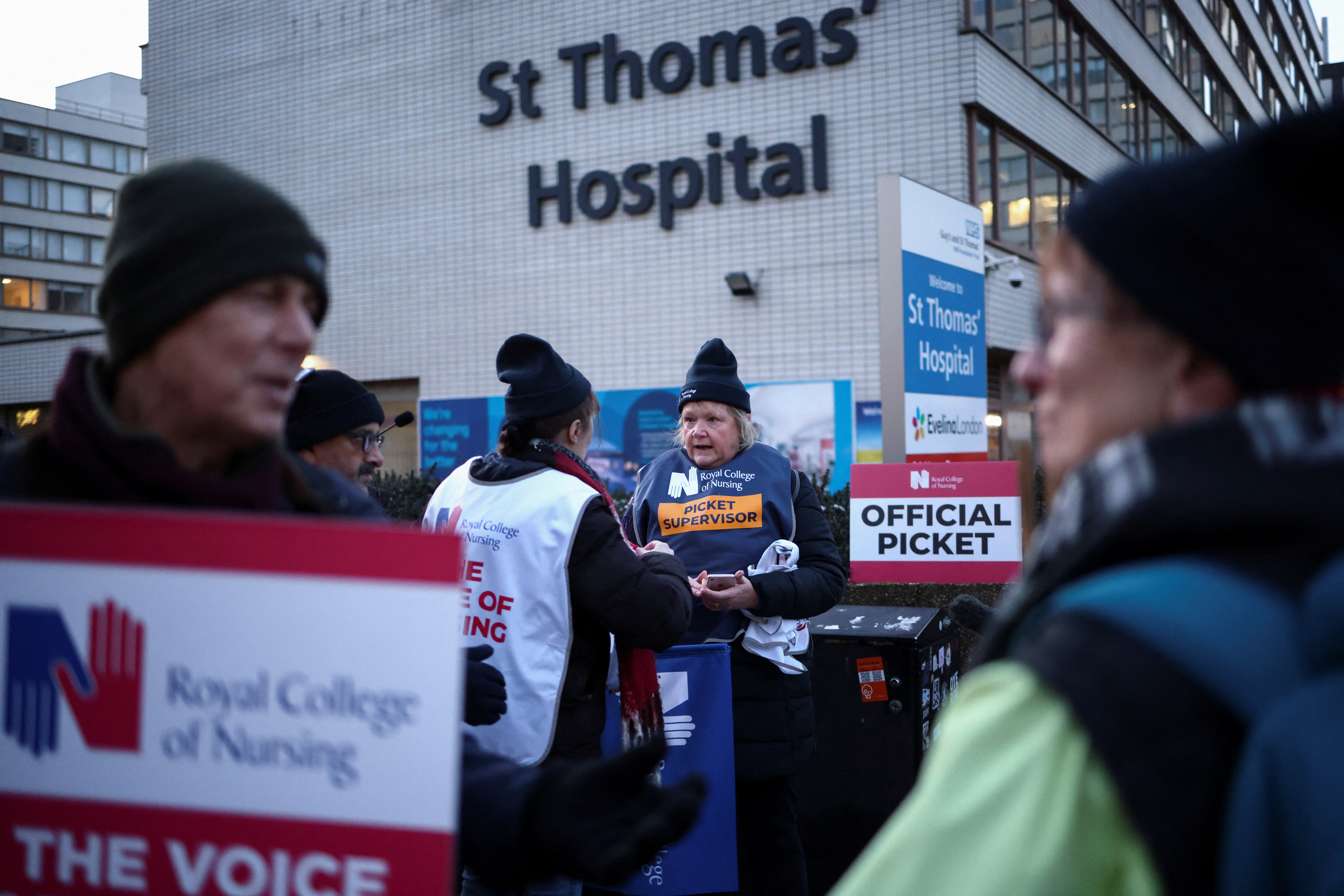 Nurses strike outside St Thomas' Hospital in London