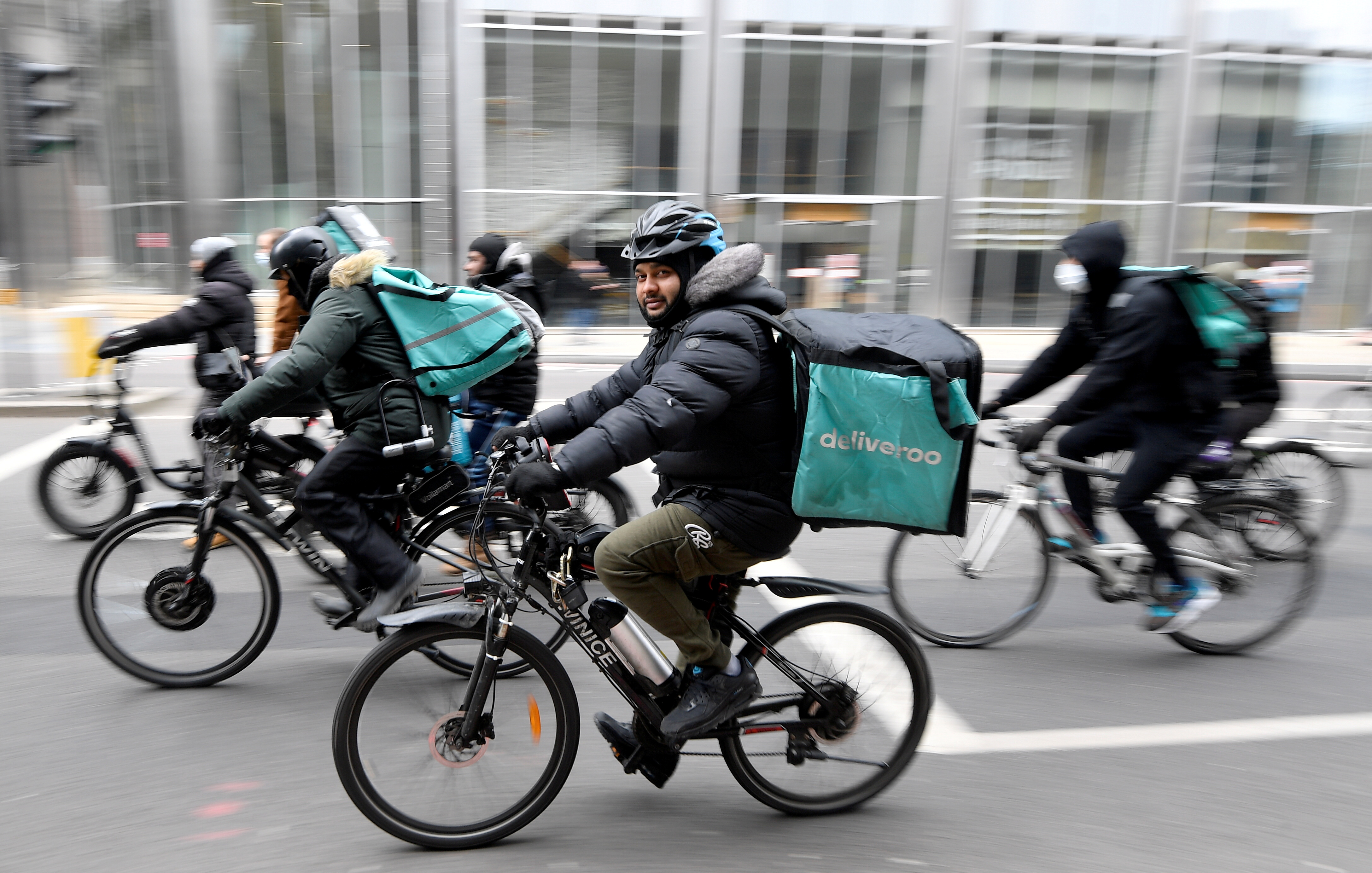 Deliveroo riders demonstrate to push for improved working conditions, in London