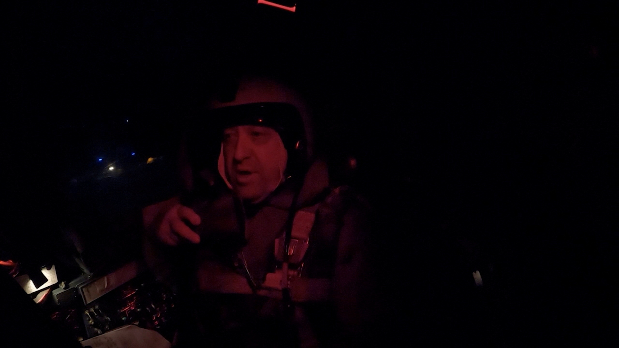 The founder of Russia's Wagner mercenary group Yevgeny Prigozhin is seen inside a cockpit of a military Su-24 bomber plane over an unidentified location