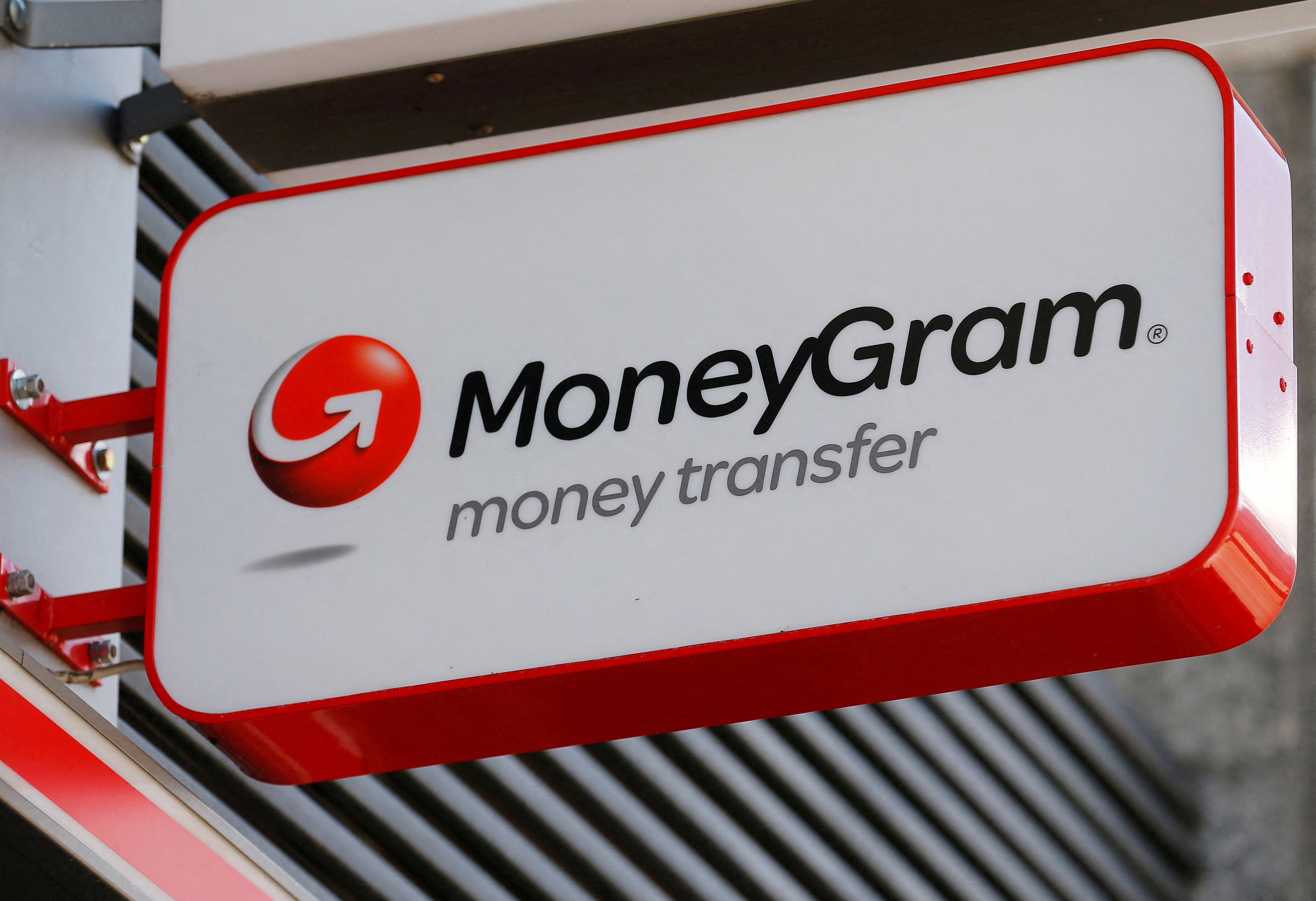 A Moneygram logo is seen outside a bank in Vienna