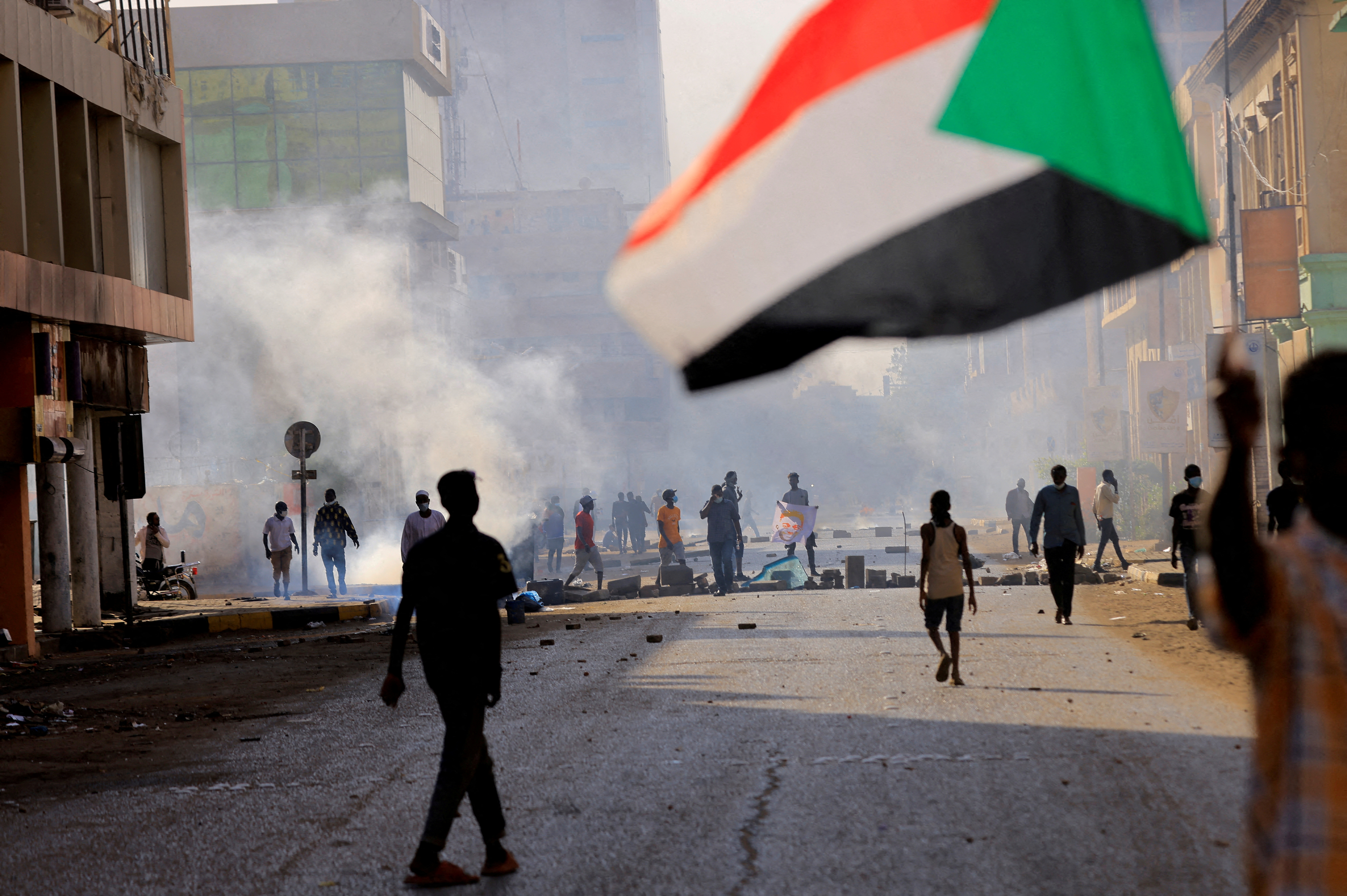 Protesters march to the presidential palace in Khartoum