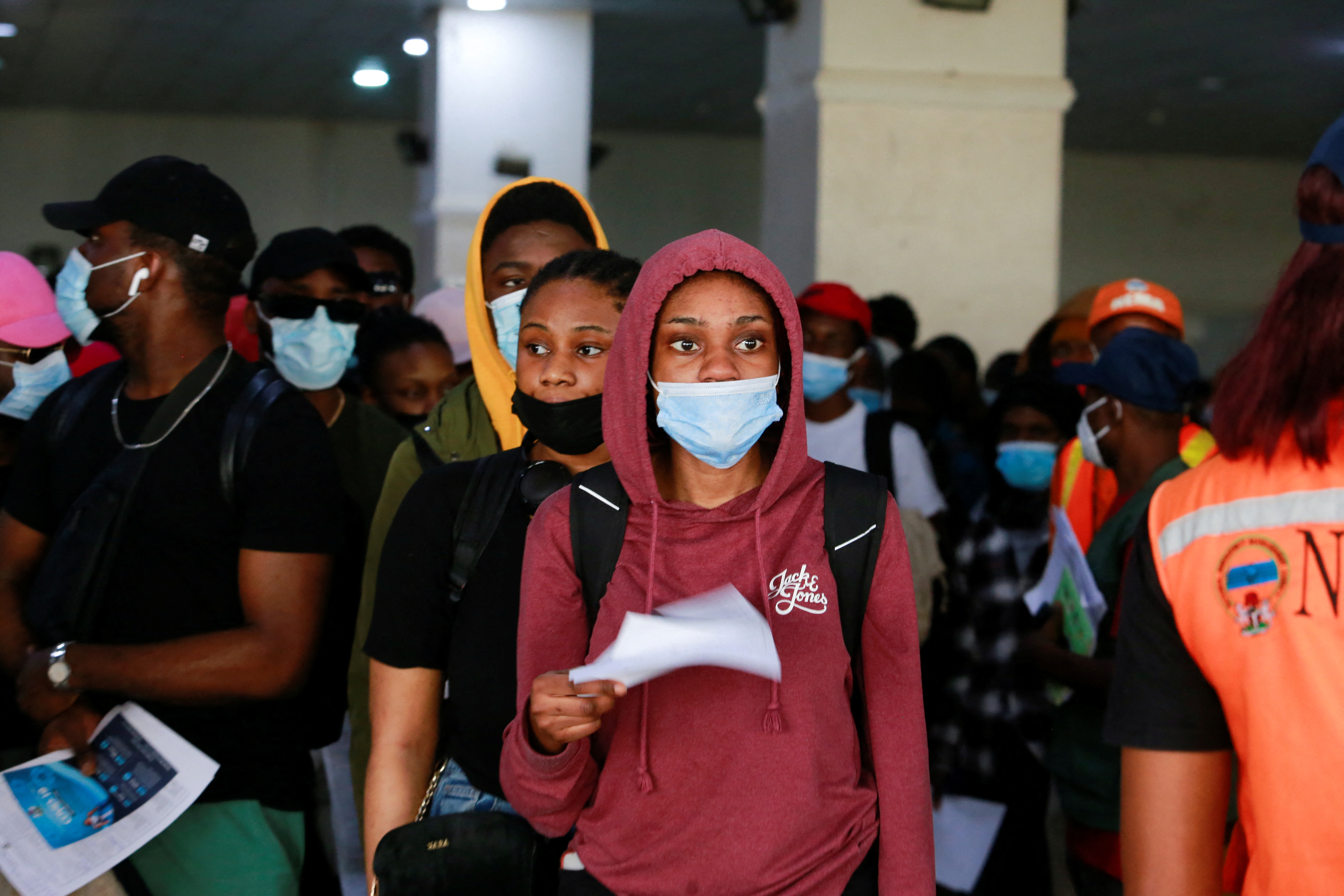 Nigerian students arrive at the Nnamdi Azikiwe International Airport in Abuja