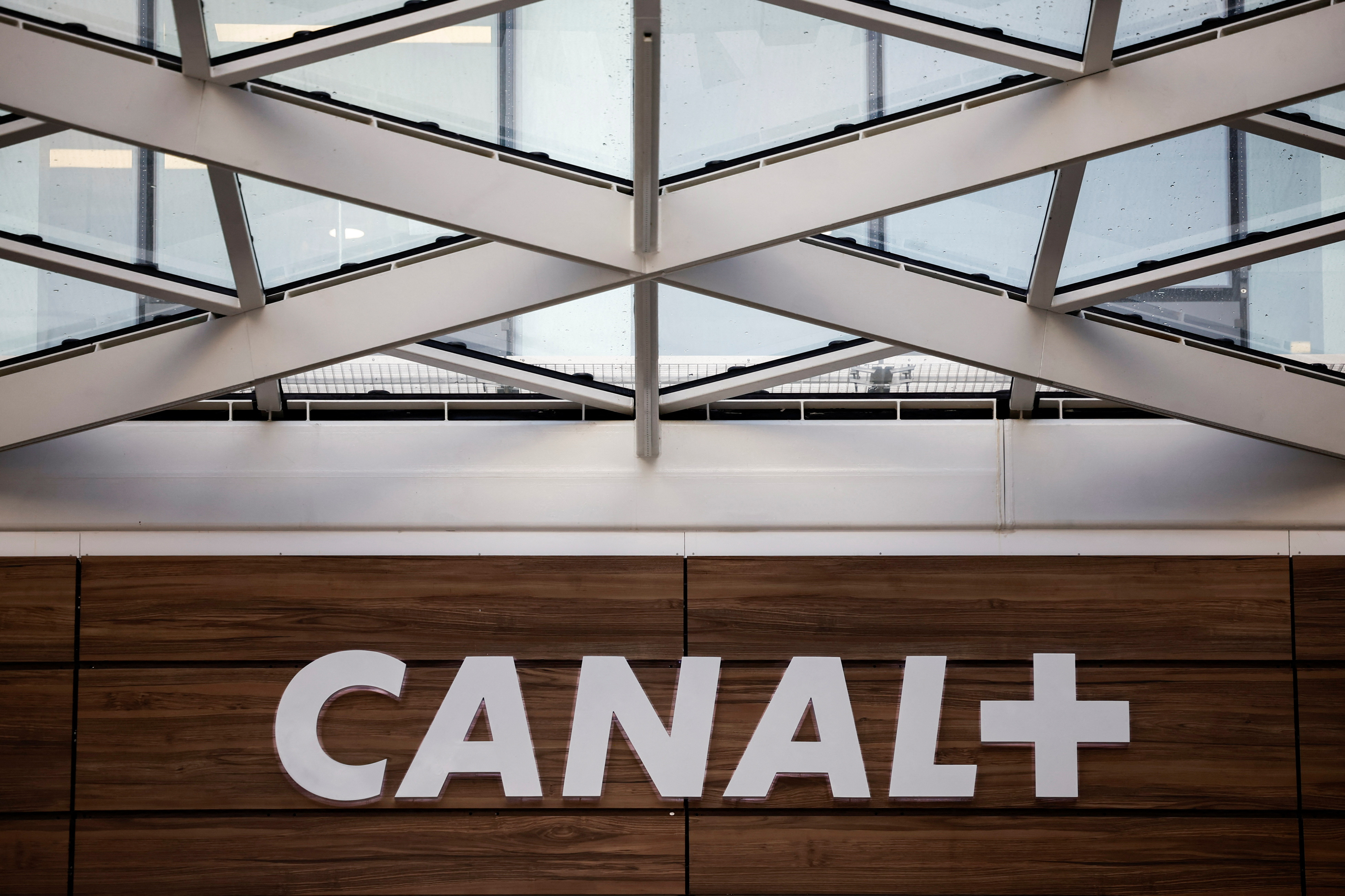 The logo of French TV channel 'Canal Plus' is pictured outside a company building in Issy-les-Moulineaux
