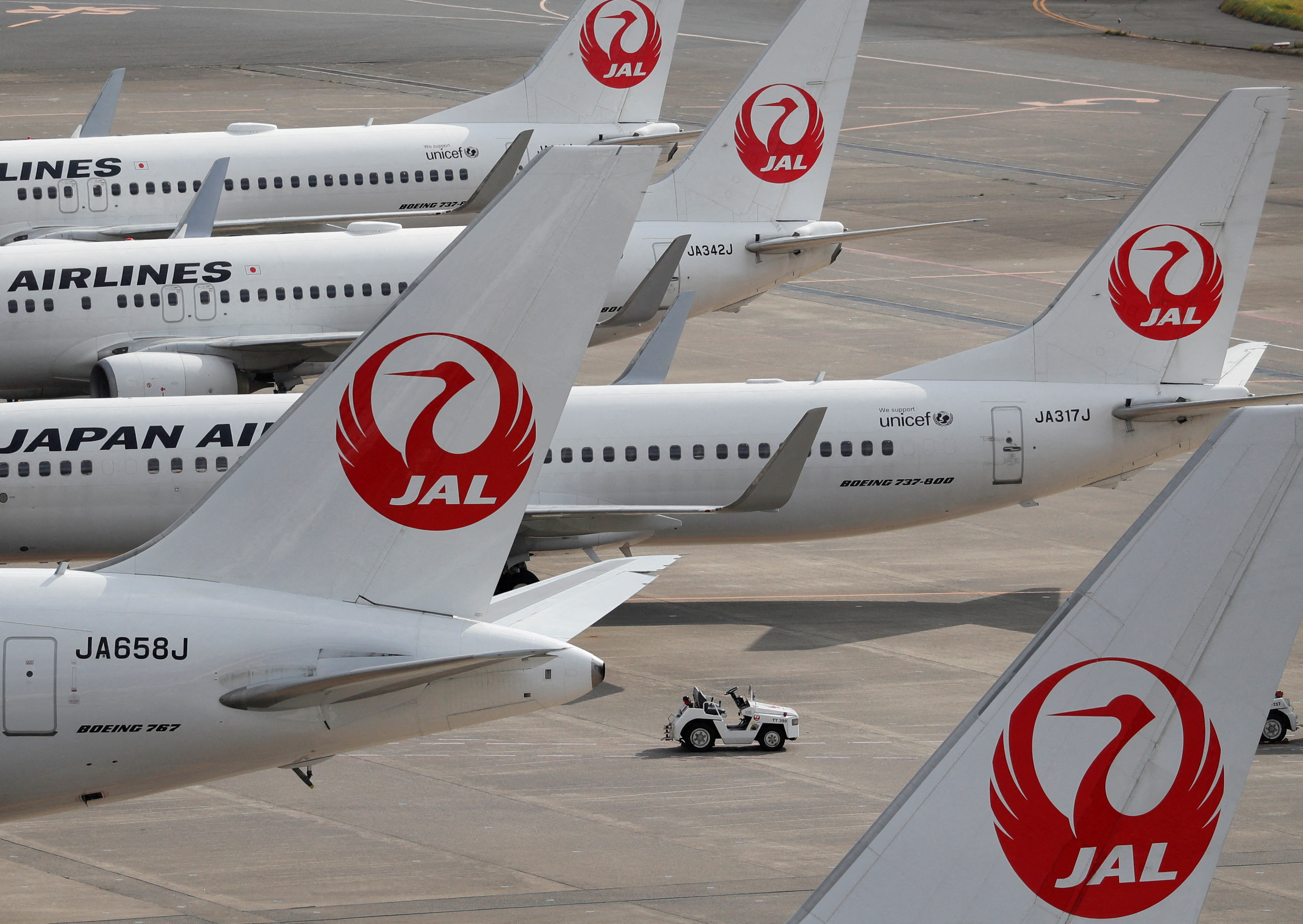 Japan Airlines' (JAL) airplanes are seen, amid the coronavirus disease (COVID-19) outbreak, at Haneda Airport in Tokyo